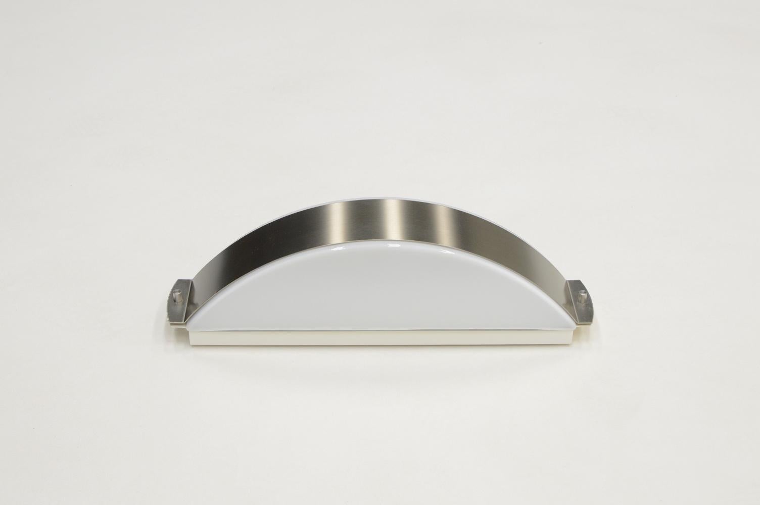 Stainless Steel Stainless steel and glass wall lamps made by Glashütte Limburg, 1970s Germany. For Sale