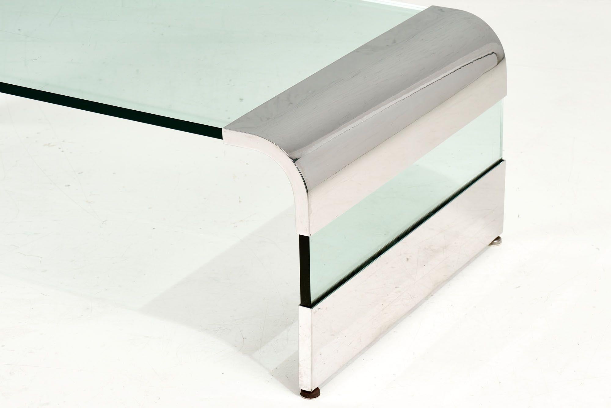 American Stainless Steel and Glass Waterfall Coffee Table by Brueton, 1970 For Sale