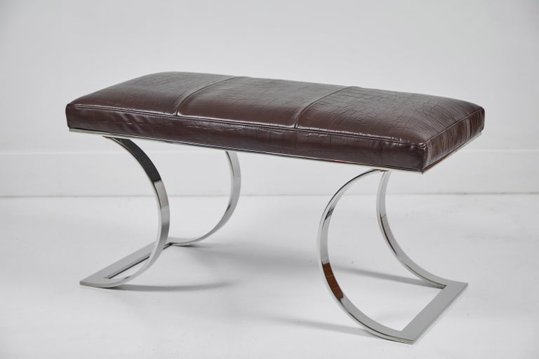 This is a chic, patterned embossed, leather upholstered Karl Springer 