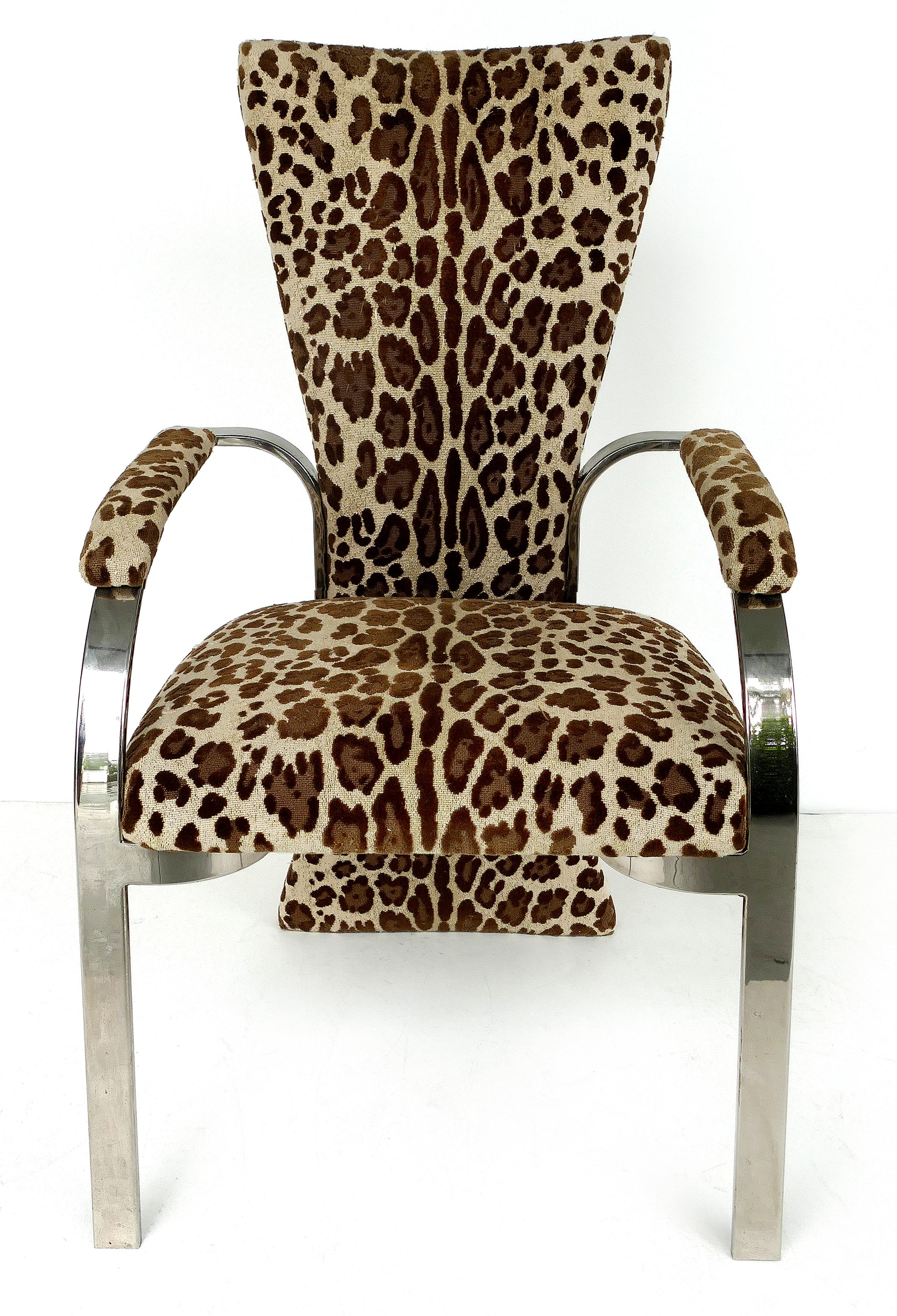 Stainless steel armchairs with leopard animal print upholstery

Offered for sale is a striking pair of upholstered armchairs with stainless steel frames and leopard animal print fabric. The chairs are substantial and quite dramatic. The chairs are