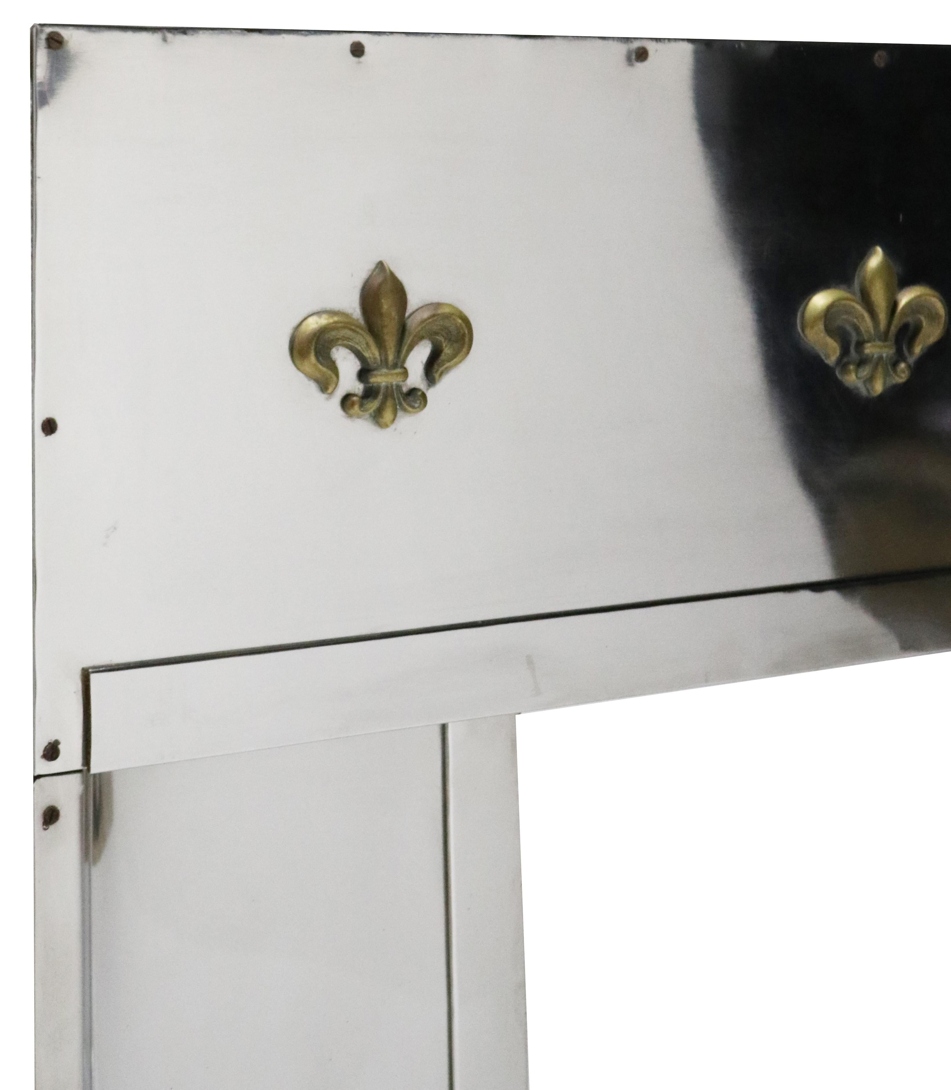 An original Art Deco fire insert constructed from stainless steel with brass embellishments.

Additional Dimensions:

Opening Height 51.5 cm

Opening width 41 cm