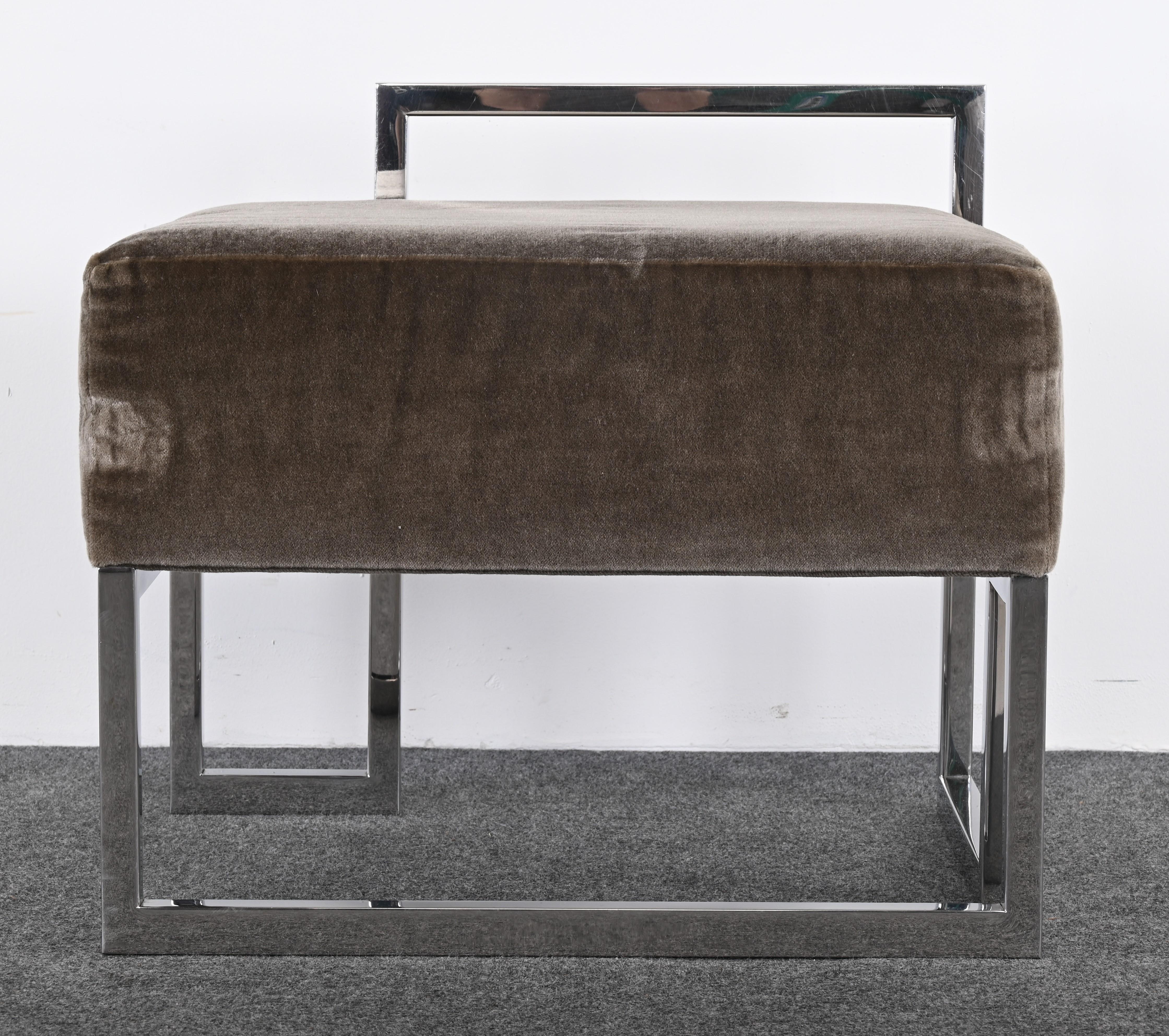 A stunning modernist stainless steel bench designed by Vladimir Kagan for Gucci, 1990s. This versatile bench would work in any interior, whether a bedroom or living room. The bench is part of a collection from the original showroom designed by Bill
