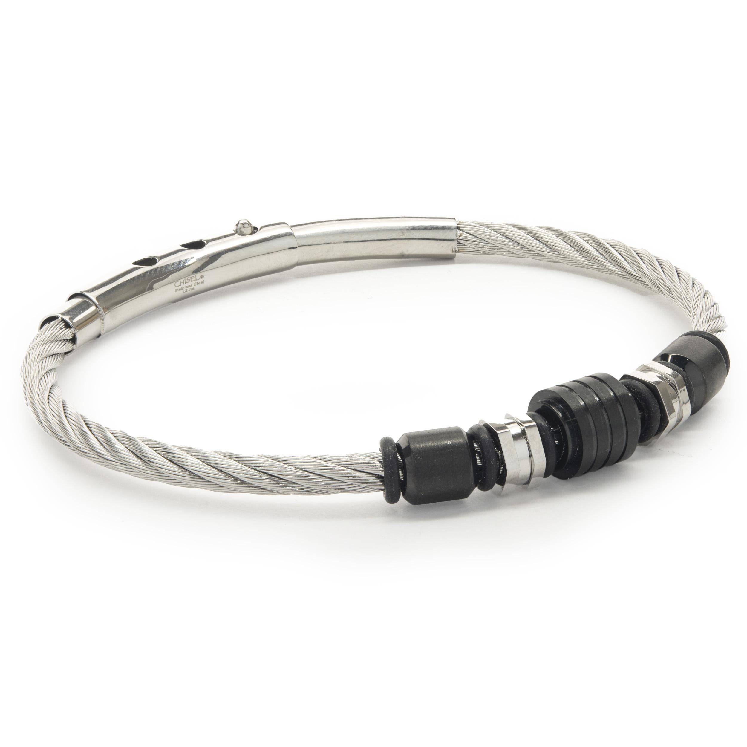 Designer: custom 
Material: stainless steel
Dimensions: bracelet will fit up to a 7-inch wrist
Weight: 19.56 grams
