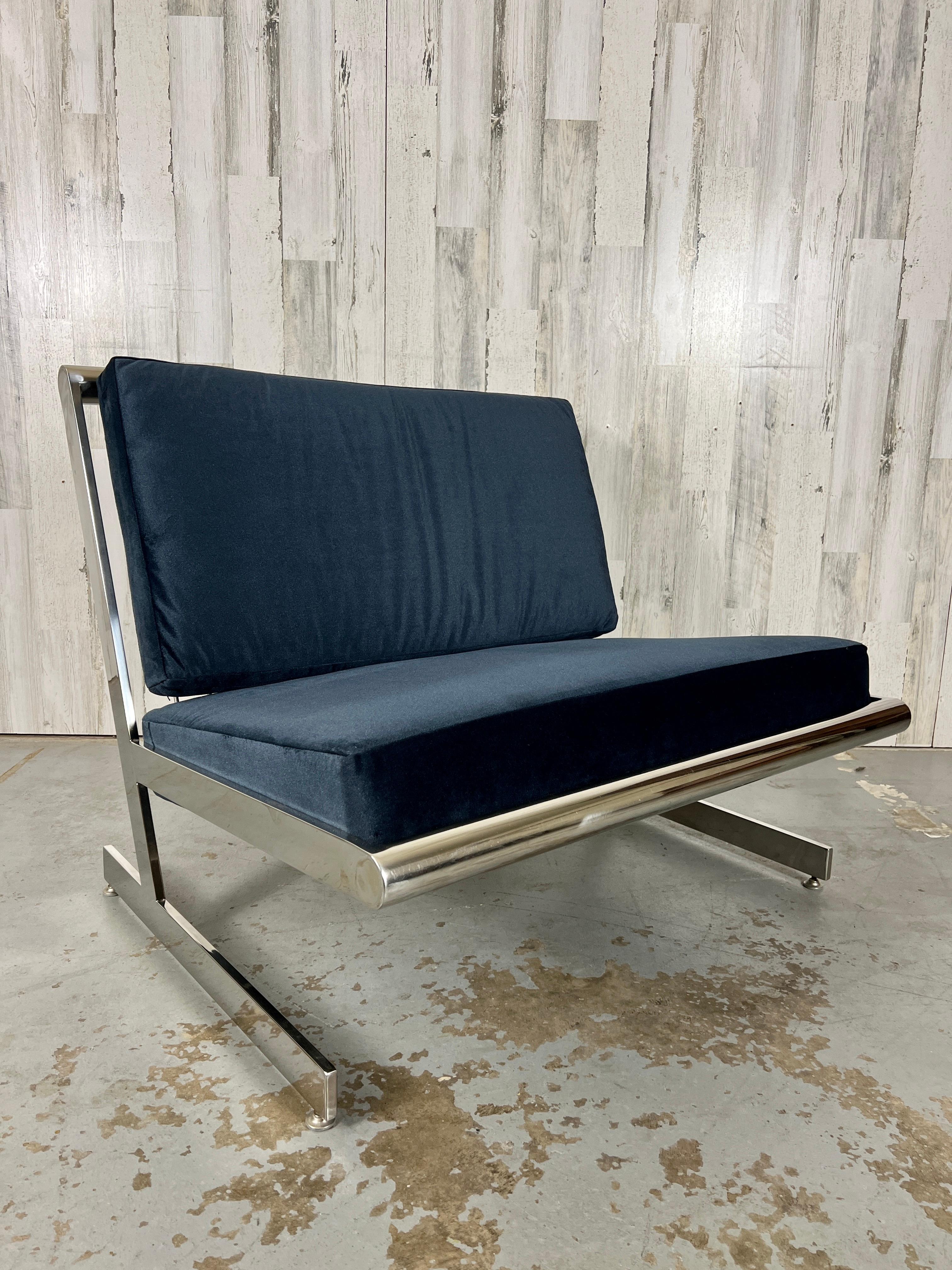 Oversized cantilever slipper chair almost settee size with new navy blue velvet upholstery.