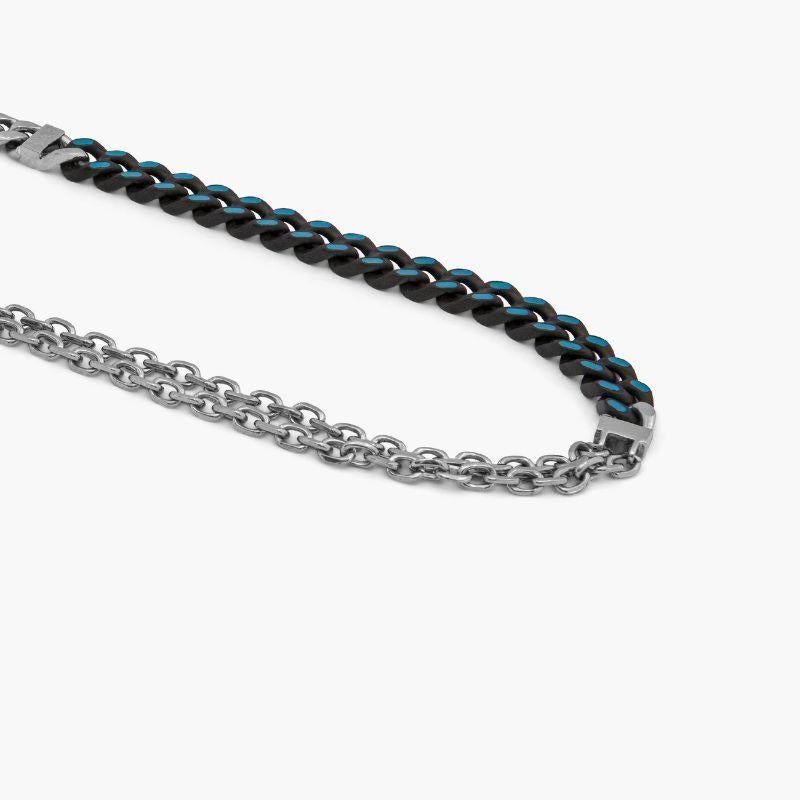 Stainless Steel Catena Multi Necklace with Blue Enamel

A modern necklace uses both black and white IP plating on the chunky chain for a bold effect. This piece has been fitted with our signature vintage watch movement and finished with a section of