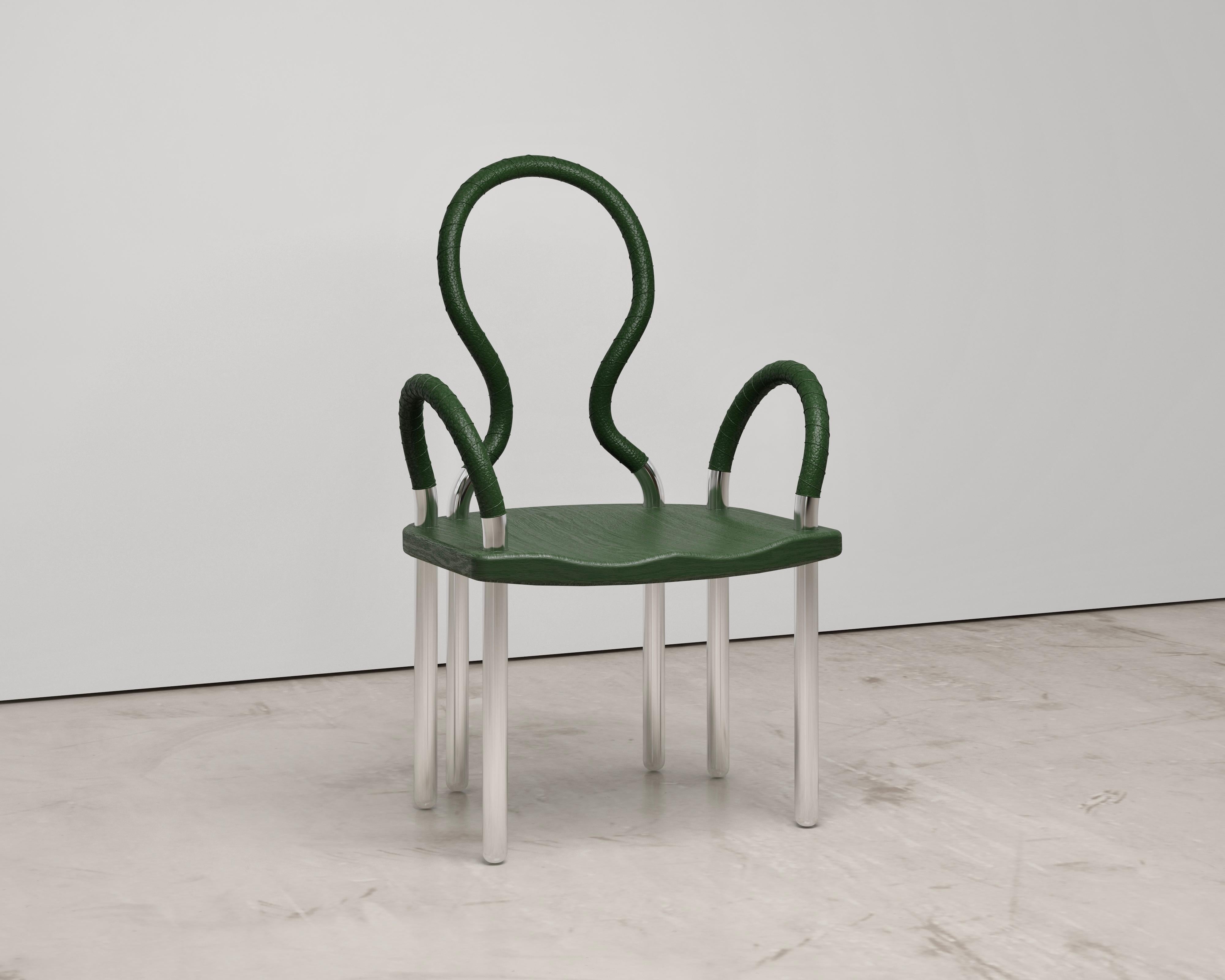 The 6 Legged Chair is made from solid brass pipe and polished to a mirror finish. The backrest and arms are wrapped in black leather, and the wood seat is ebonized white oak. The chair strikes a balance between furniture and art. The chair has been