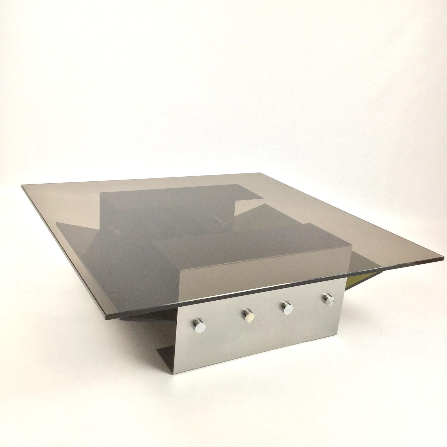 1970s stainless steel coffee table with perspex magazine rack
and large brown top glass.
In a style of the French designer François Monnet for Kappa.