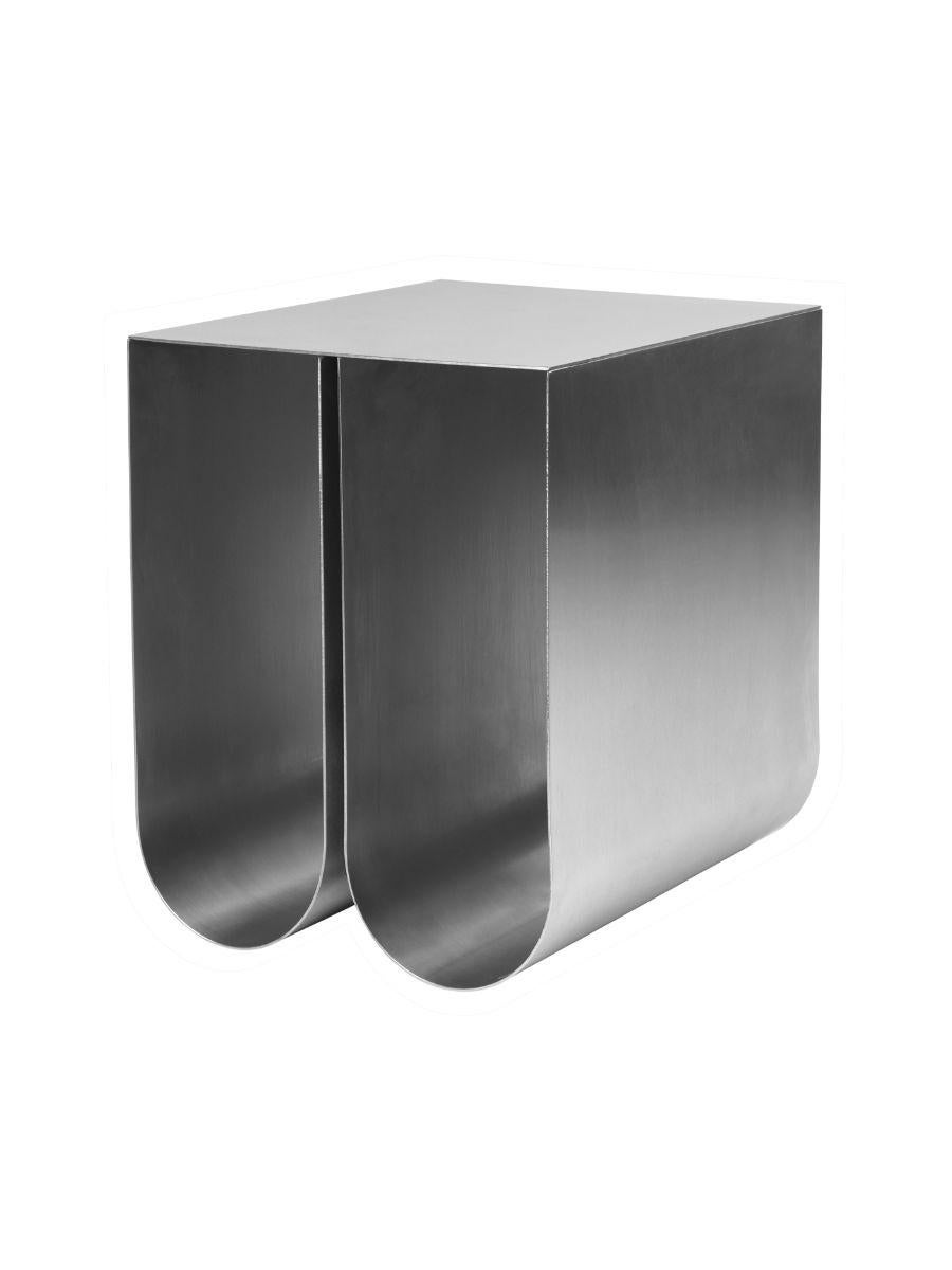 Stainless steel curved side table by Kristina Dam Studio
Materials: Polished stainless steel. 
Also available in different colors. Please contact us for more information. 
Dimensions: 35.5 x 26 x H 36cm

The Modernist furniture collection takes