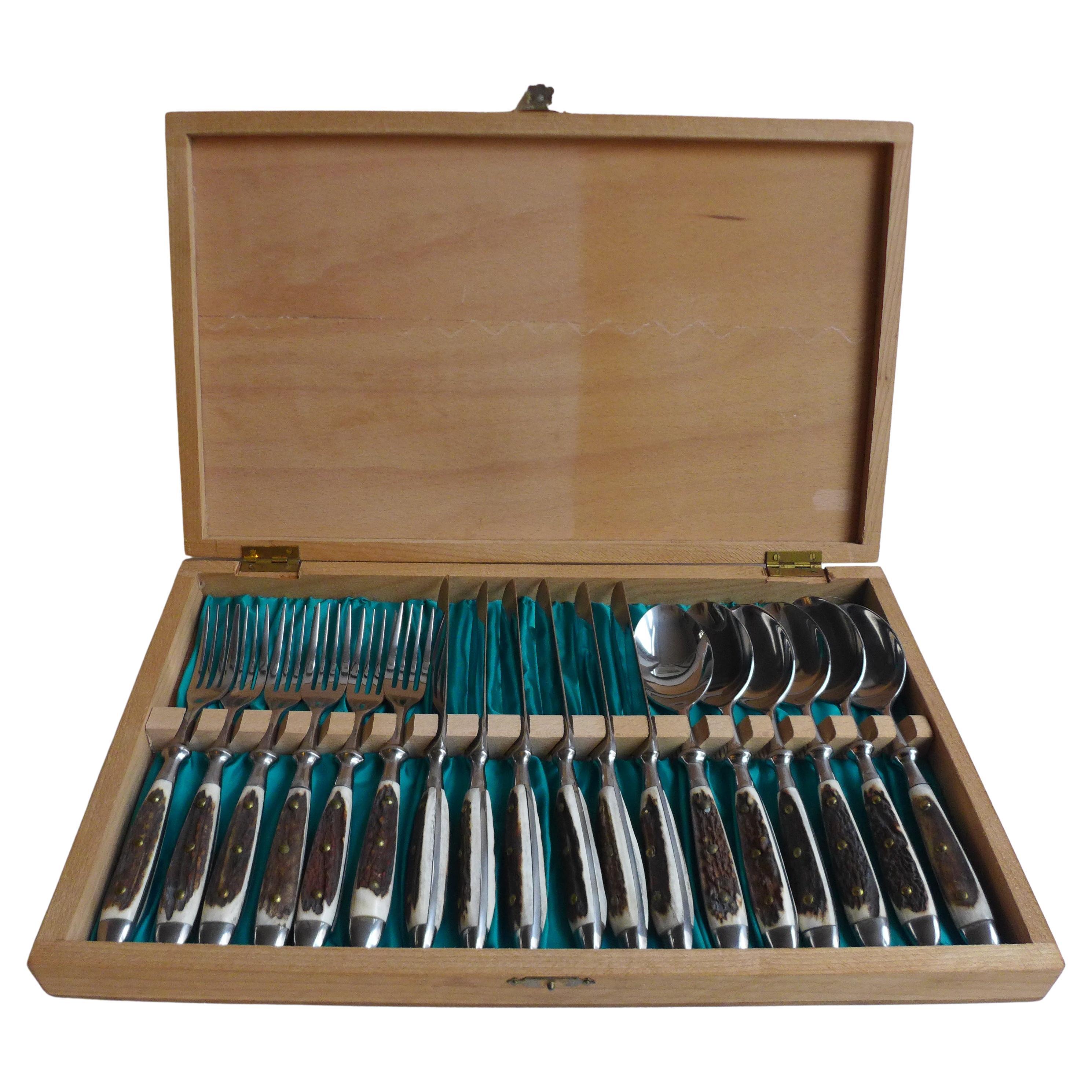 stainless-steel cutlery set with antler handles Solingen Germany