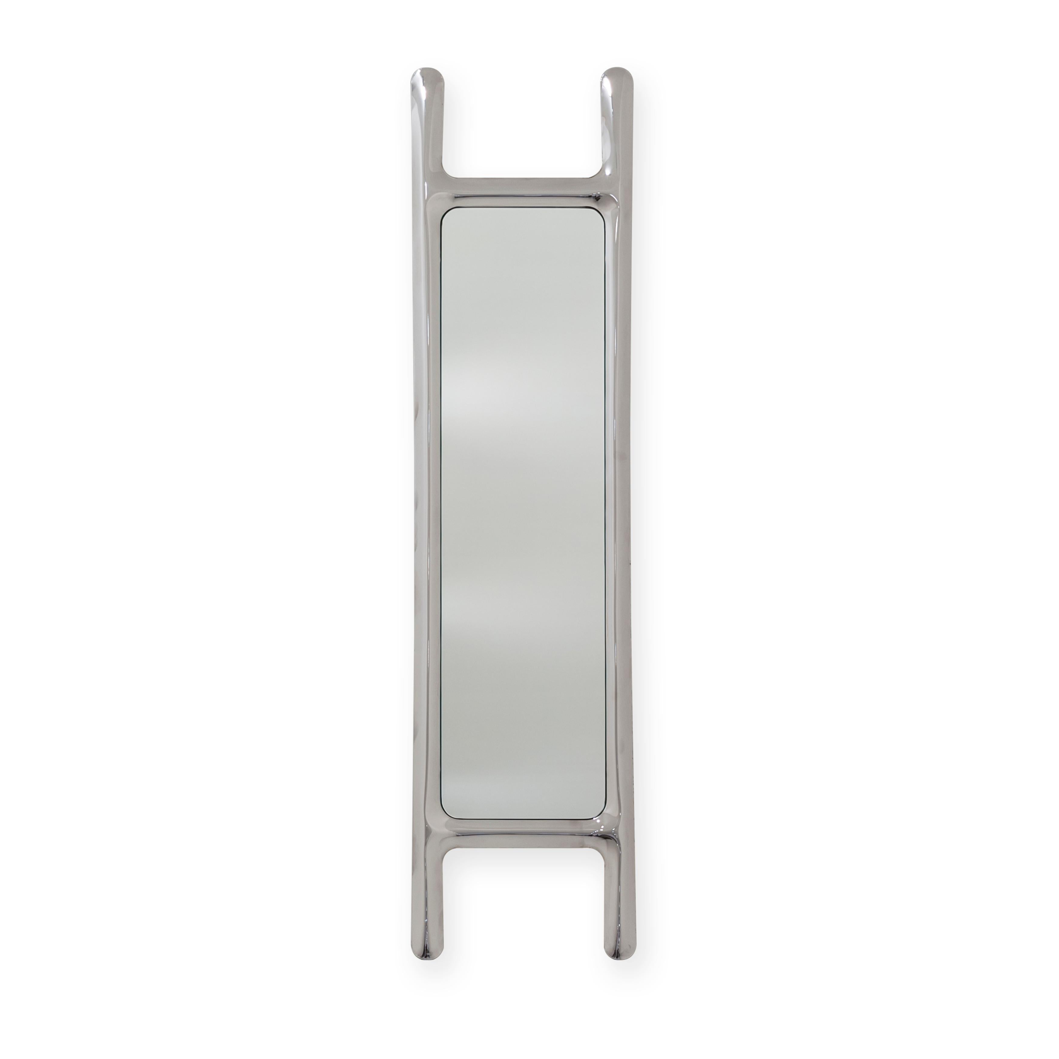 Stainless steel drab sculptural wall mirror by Zieta
Dimensions: D 6 x W 46 x H 188 cm 
Material: Mirror, stainless steel. 
Finish: Polished.
Also available in colors: stainless steel, or powder-coated. 


A DRAB mirror is an object that