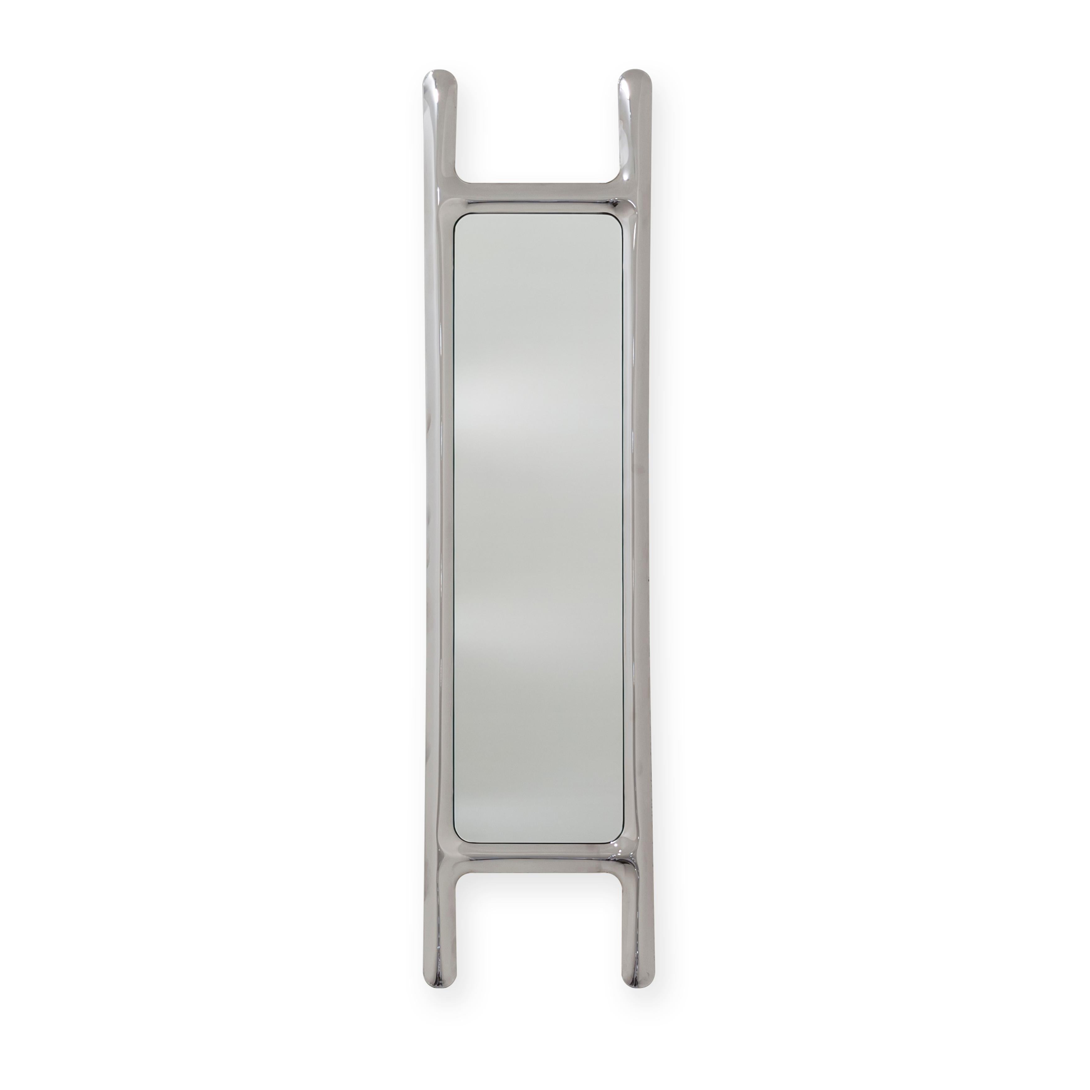 Specchio da parete scultoreo in acciaio inox drab di Zieta
Dimensioni: P 6 x L 46 x H 188 cm 
Materiale: Specchio, acciaio inox. 
Finitura: Lucido.
Disponibile anche nei colori: acciaio inox o verniciato a polvere. 


Uno specchio DRAB è un
