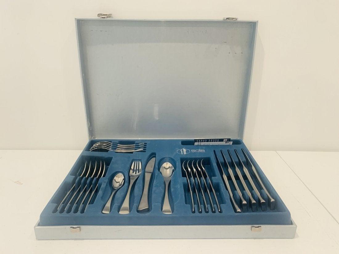 Beautiful stainless steel flatware set by Sola, Switzerland.
The pieces are made in stainless steel, the set is for up to 6 people, comes in the original box and are in like new condition.

Fork is 8 inches long.
Knife is 8.5 inches long.
Soup
