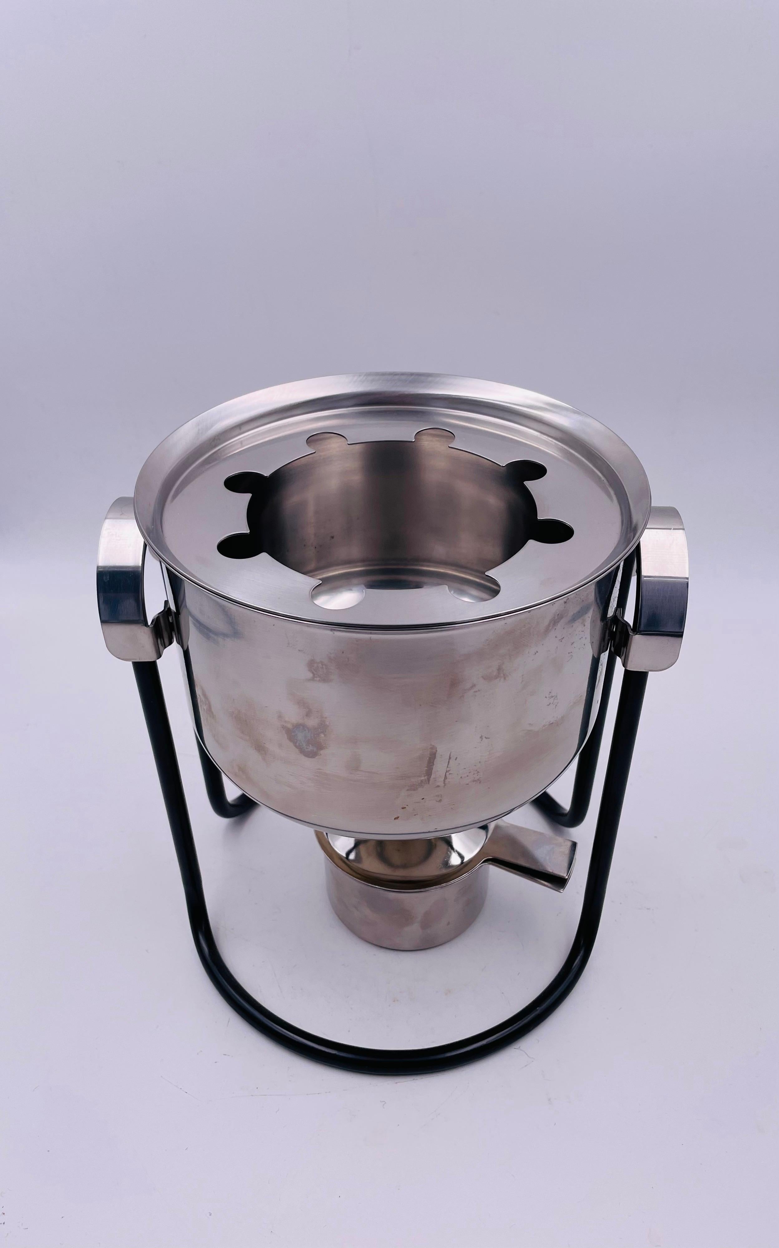 Cool and great design stainless steel fondue pot, by Stelton great condition and great for parties.