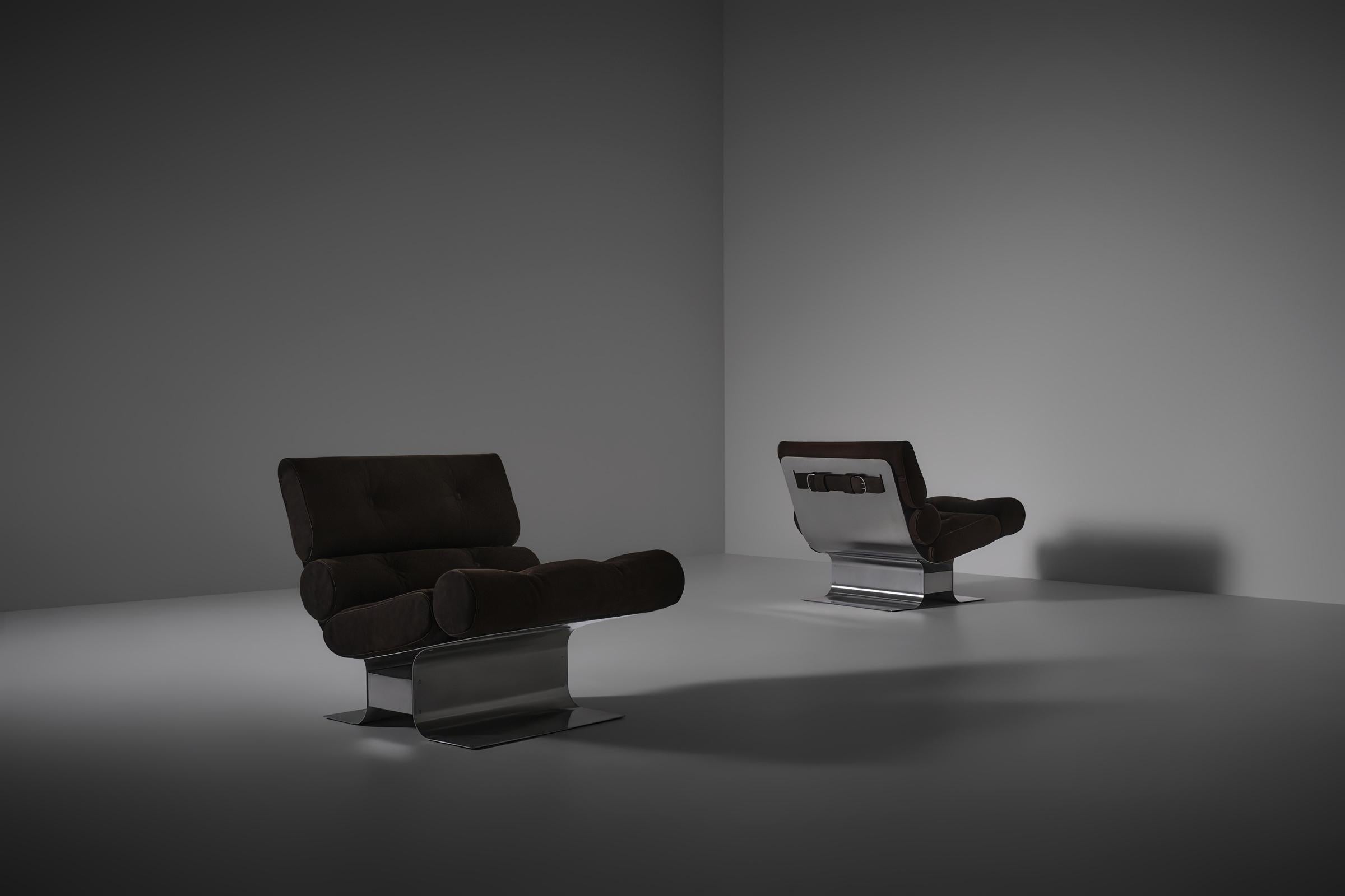Iconic pair of stainless steel lounge chairs by François Monnet for Kappa, France 1970s. Striking design composed of curved stainless steel frames with bulky-shaped cushions. The cushions are upholstered in dark pure chocolate brown nubuck leather,