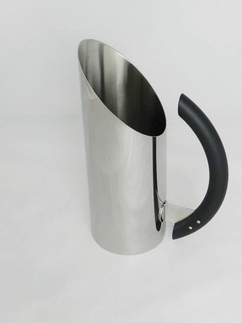Alessi pitcher carafe
18/10 mirror polished stainless steel, black handle

Alessi's MIA pitcher is a shining example of the Italian label's sleek and contemporary design aesthetic. Crafted in 18/10 mirror polished stainless steel with a black
