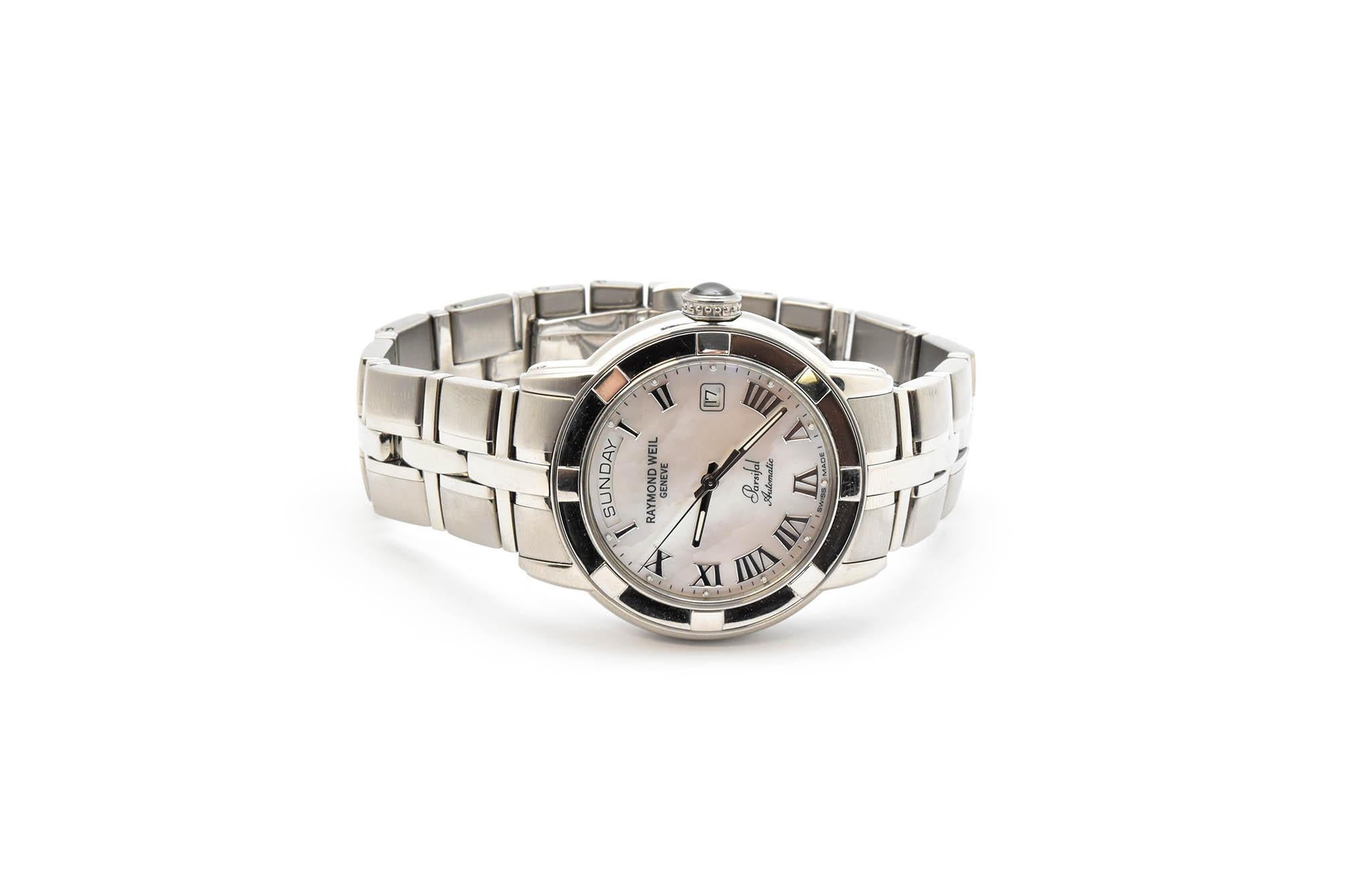 Movement: automatic
Function: hours, minutes, sweep seconds, date, day
Case: 40mm stainless steel case, sapphire crystal, exhibition case back
Band: steel bracelet with steel deployment clasp fits up to a 7.5-inch wrist
Dial: mother of pearl dial,