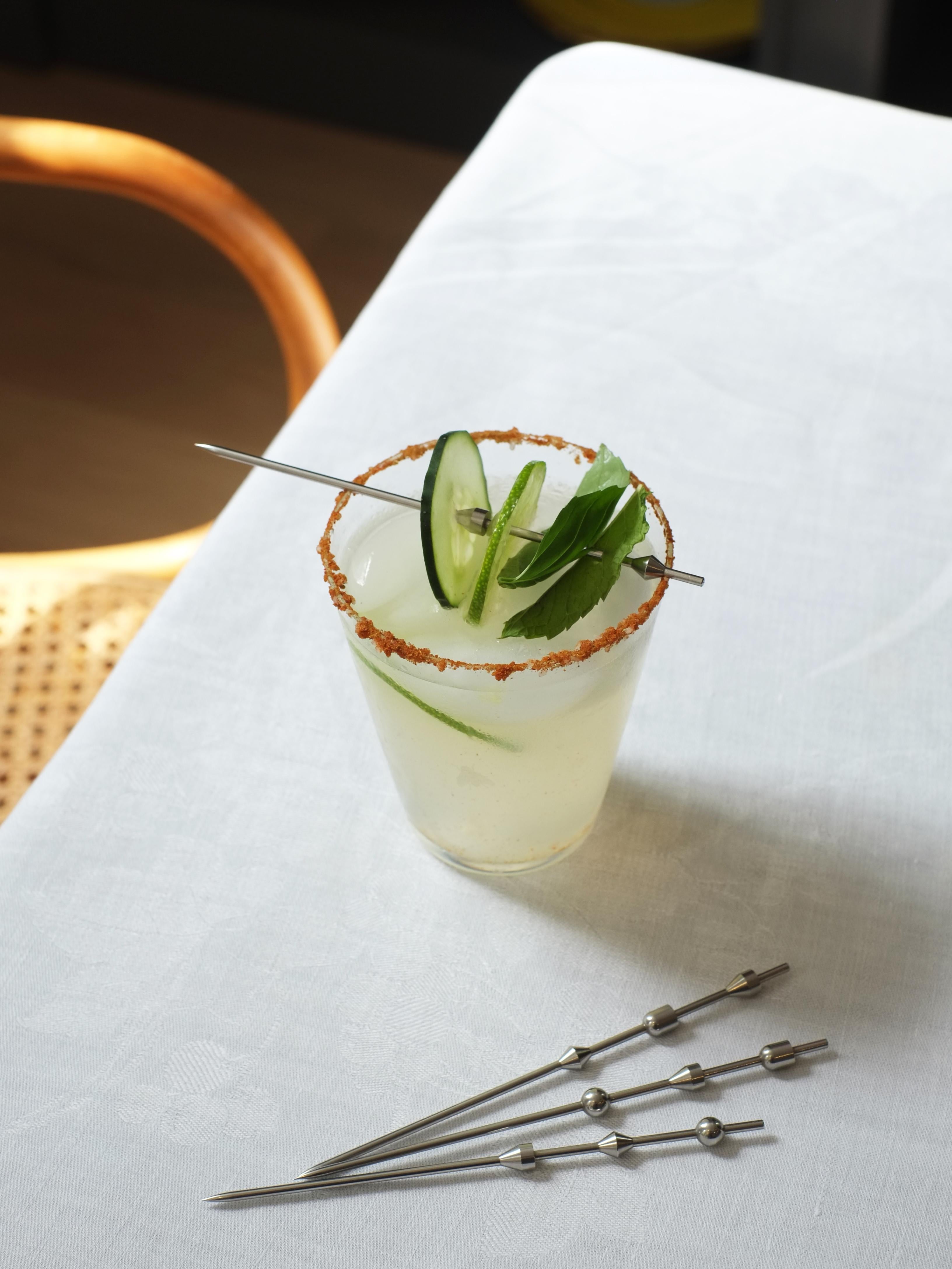Inspired by the forms of nautical buoys and fishing bobbers, these stainless steel picks keep cocktail garnishes afloat! Using simple, geometric forms along a thin rod, the contemporary designs make any drink more professional and any bar more