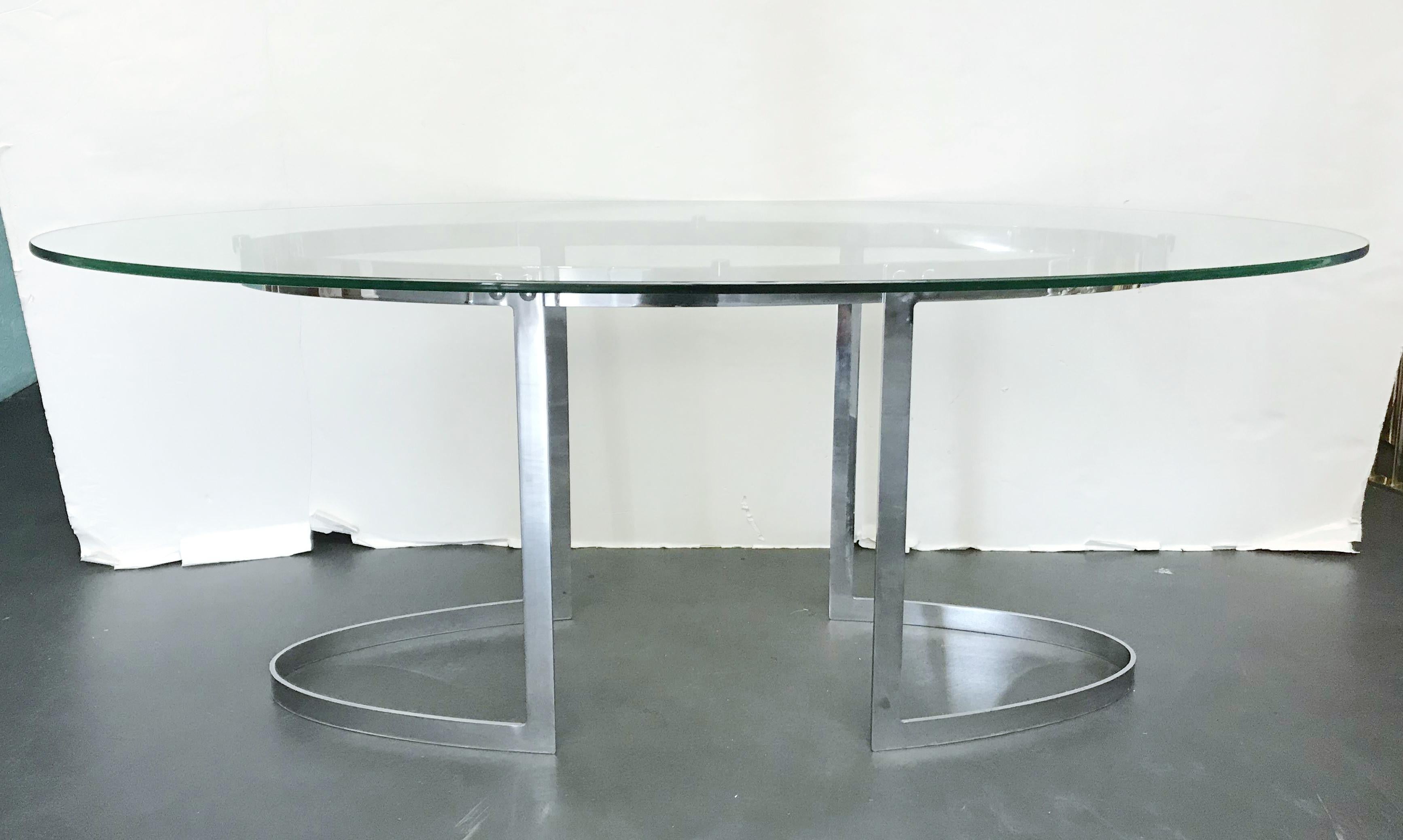 Vintage center or sofa table with thick oval beveled glass top and stainless steel base / Made in the USA, circa 1970s
Measures: Width 74 inches, depth 31.5 inches, height 27.5 inches
1 available in stock in Palm Springs on FINAL CLEARANCE SALE for
