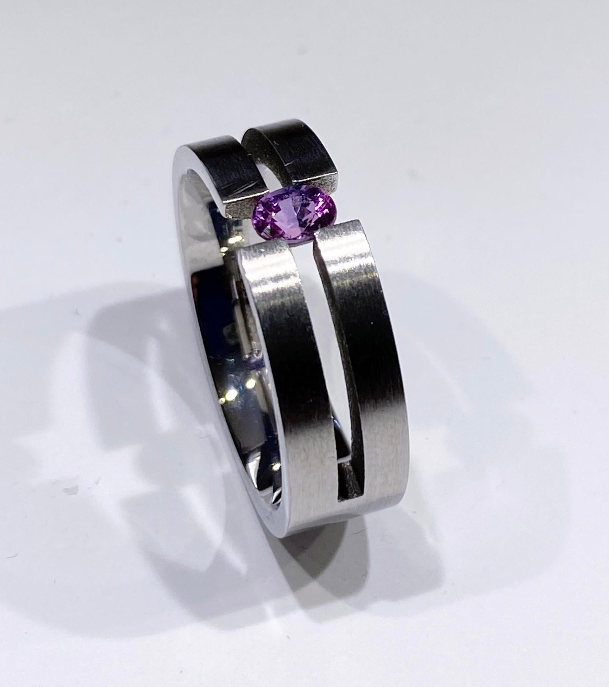 Contemporary Stainless Steel Tension Ring set with a Purple Sapphire  For Sale