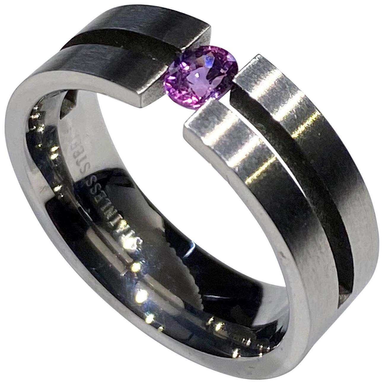 Stainless Steel Tension Ring set with a Purple Sapphire  For Sale