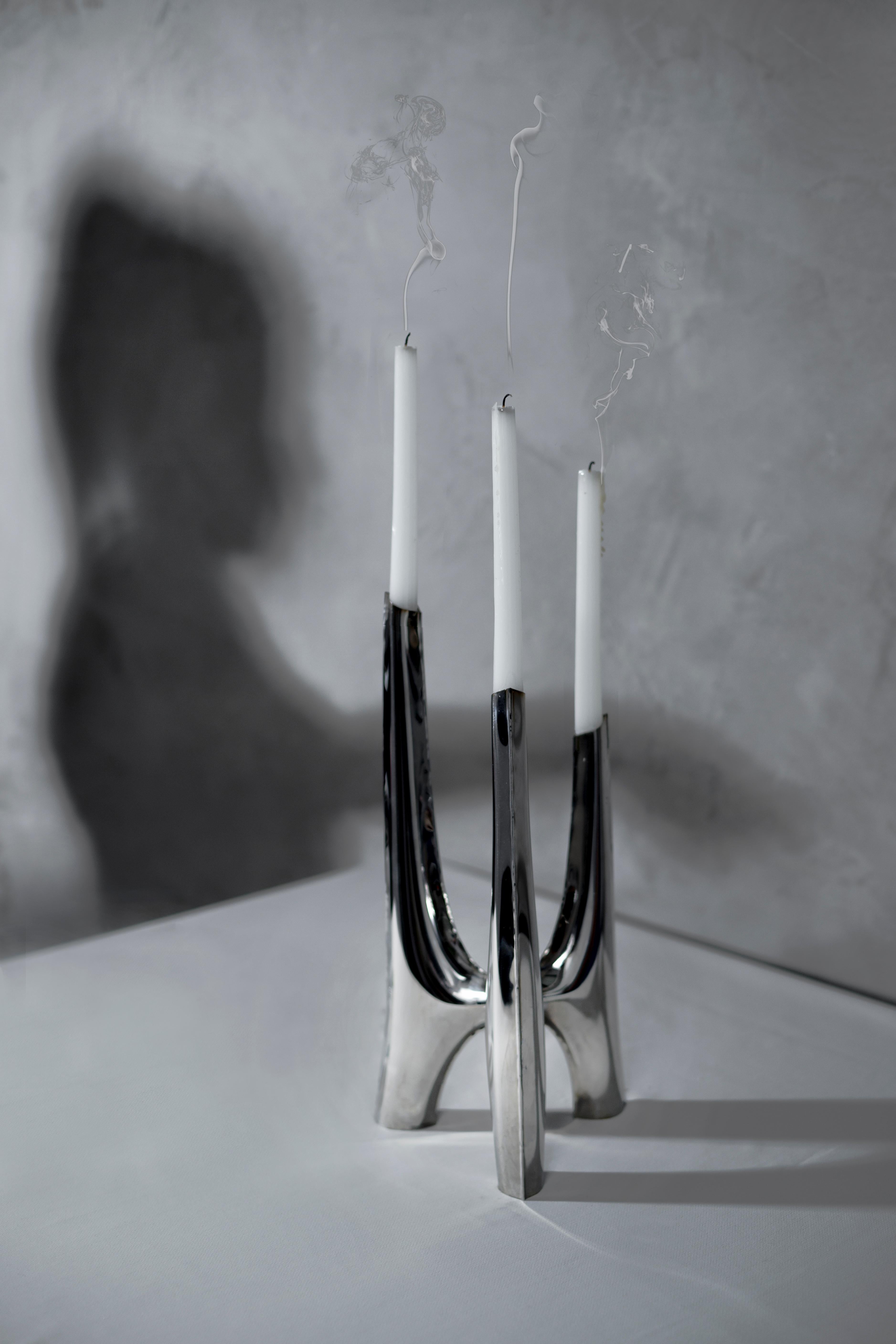 Usually made of metal, the modern candle holders are available in myriad shapes and styles. From simple, Minimalist ones to opulent, eclectic candelabra. Triglav, a steel candle holder from Zieta Studio, is a candelabrum with three arms of unusual