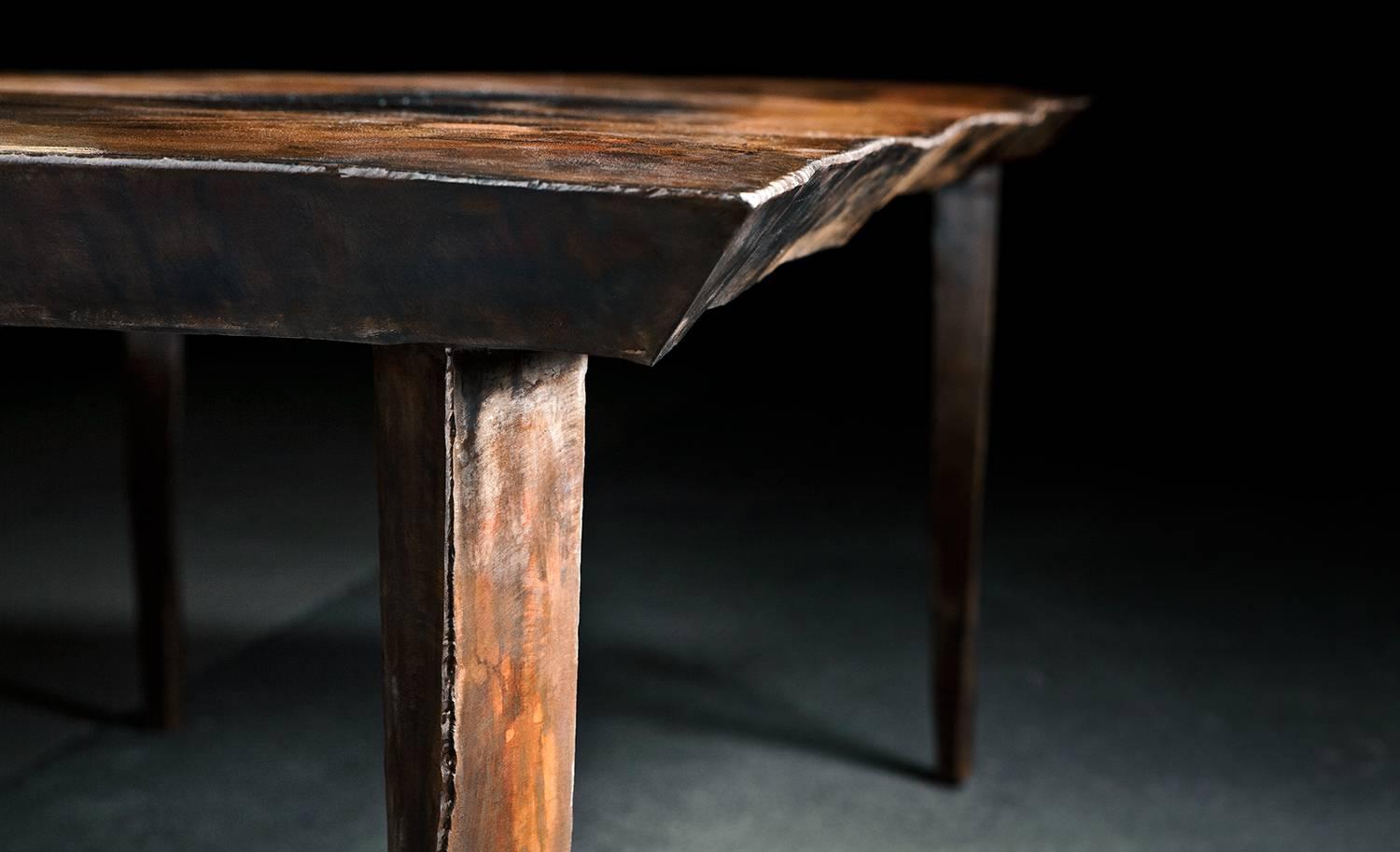 Michael Gittings Studio.
Stainless table
Patinated stainless steel.
Dimensions: 220 cm x 75 cm x 100 cm
Limited Edition of 10.

Michael Gittings
Melbourne based designer Michael Gittings aims to
challenge pre-conceptions around furniture,