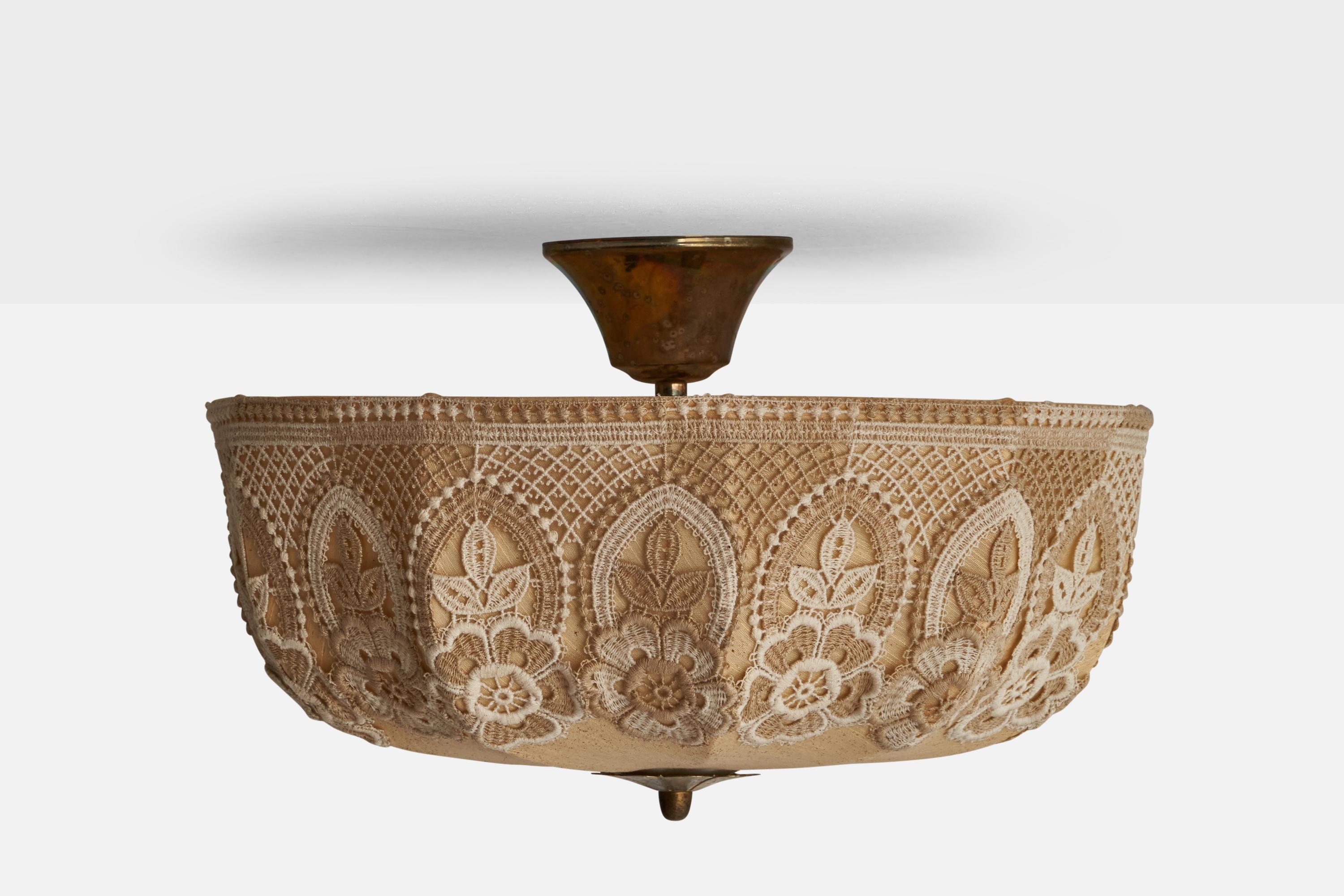 A brass and beige pendant light or semi flush mount with embroidery, designed and produced by Ståks Armatur, Moheda, Sweden, c. 1970s.

Dimensions of canopy (inches): 10” H x 16” Diameter
Socket takes standard E-26 bulbs. 2 sockets.There is no