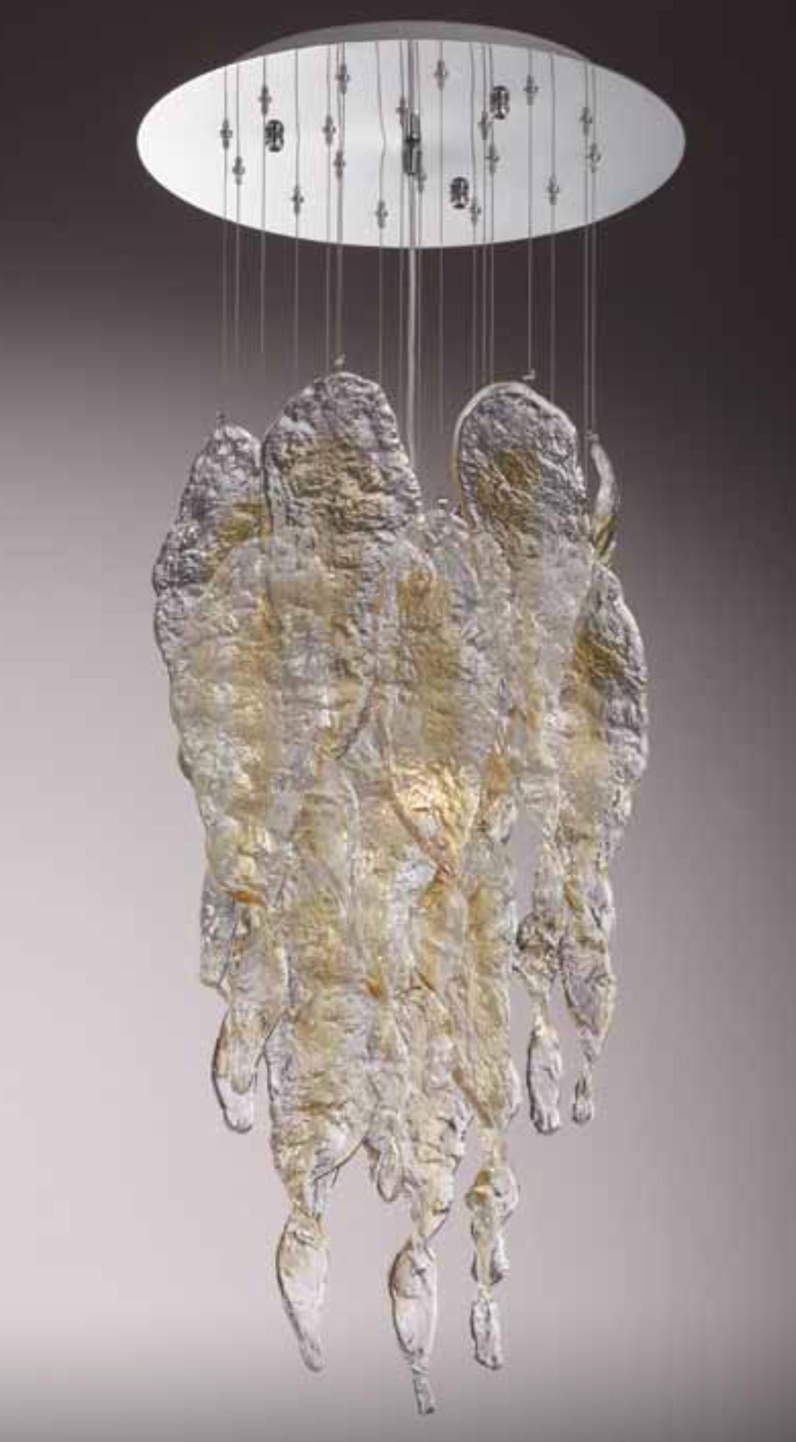 Italian flush mount shown with amber and clear Murano glasses hand blown to form beautiful dangling stalactite shaped glasses, mounted on round stainless steel ceiling plate / inspired by Mazzega / Made in Italy
3 lights / E26 or E27 type / max 60W