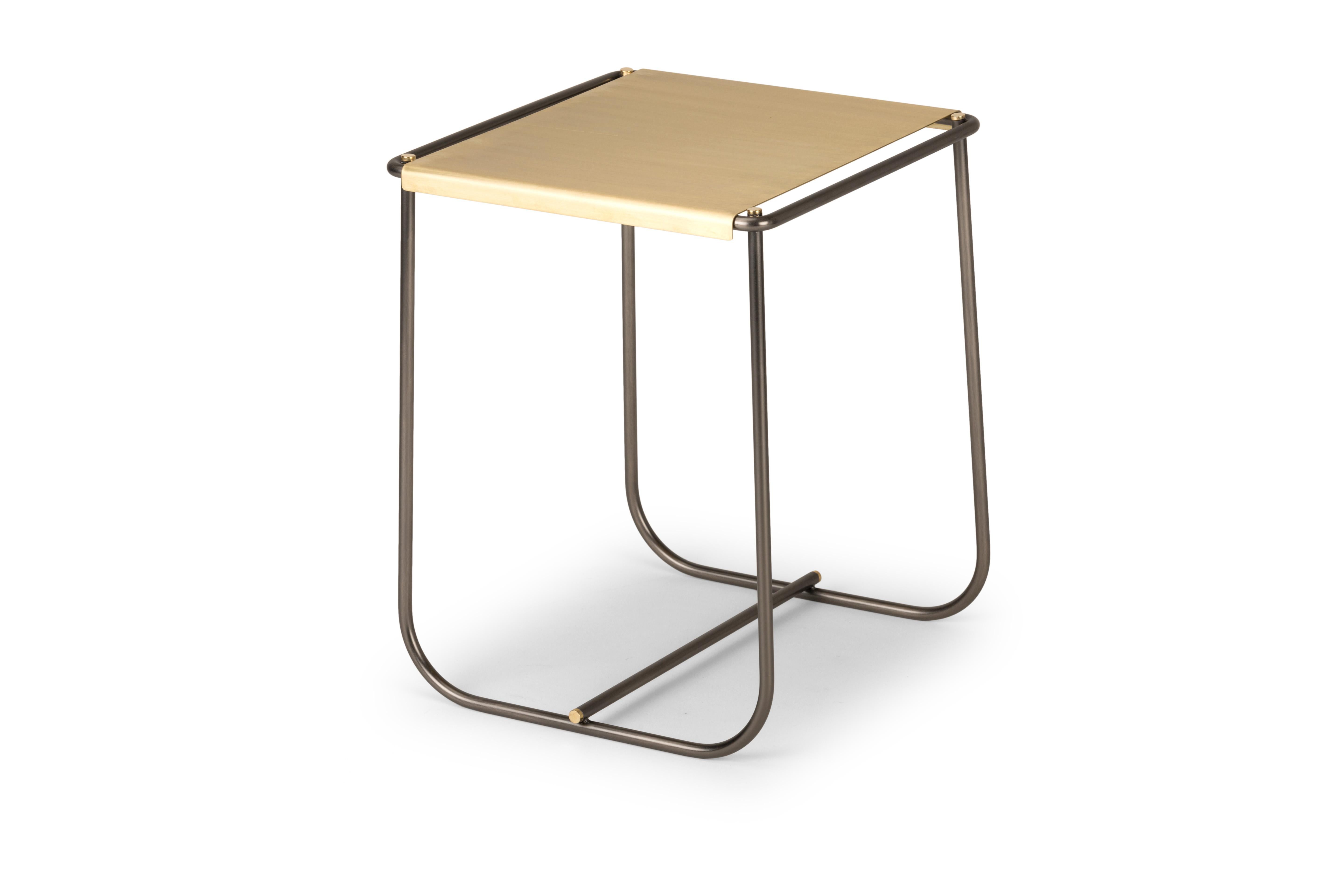 Stam stool by Mingardo
Dimensions: D 37 x W 36.5 x H 46.5 cm 
Materials: Bent metal tube structure and natural brass seat
Weight: 12 kg
Also available in different finishes. 

A bent metal tube surrounds the seat made in natural brass. Brass