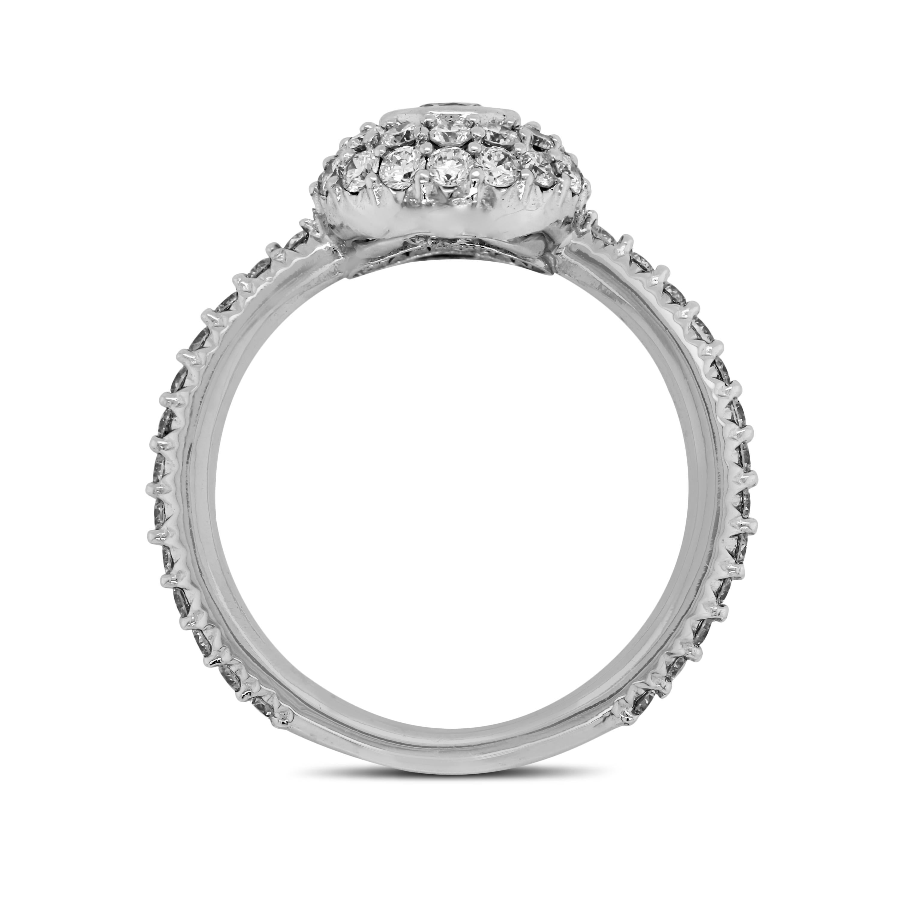 Stambolian 0.25 Carat Bezel Pavé Set Diamonds 18K White Gold Cocktail Ring

This fun, everyday ring features diamonds set all throughout with a bezel-set diamond center

1.09 carat G color, VS clarity diamonds total weight. (Center diamond is 0.25