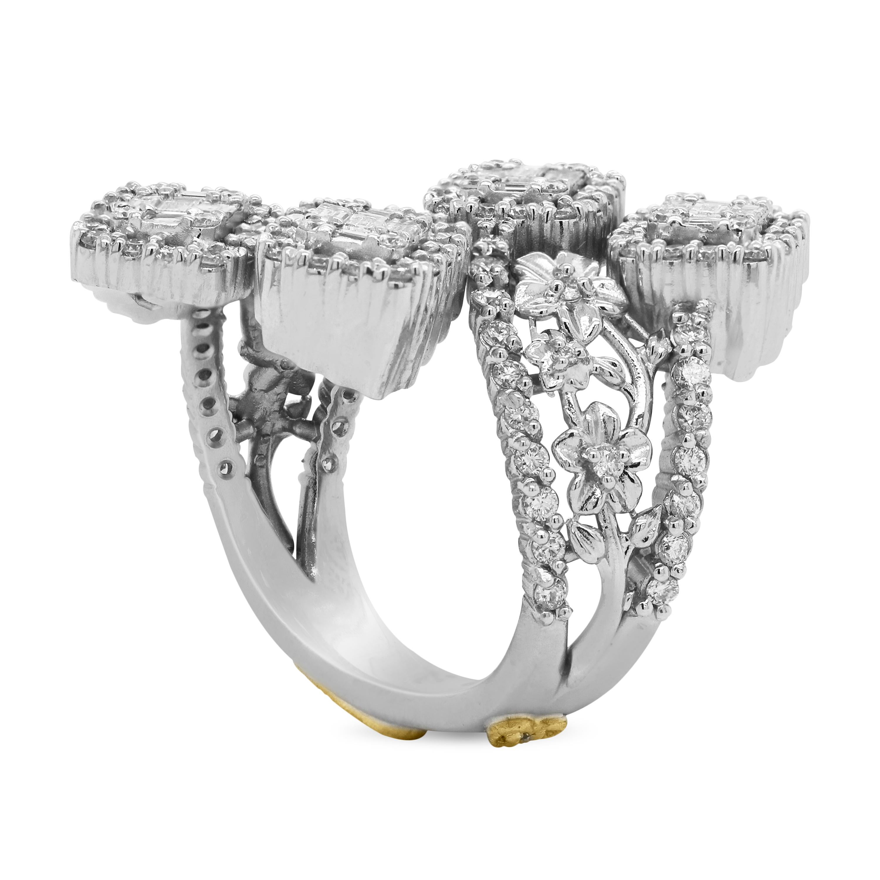 Stambolian 18 Karat White Gold Baguette Round Diamond Floral Bypass Flower Ring

This work of art is hand made in the United States by Stambolian and features a floral pattern on both sides of the band leading to the baguette diamonds center. The