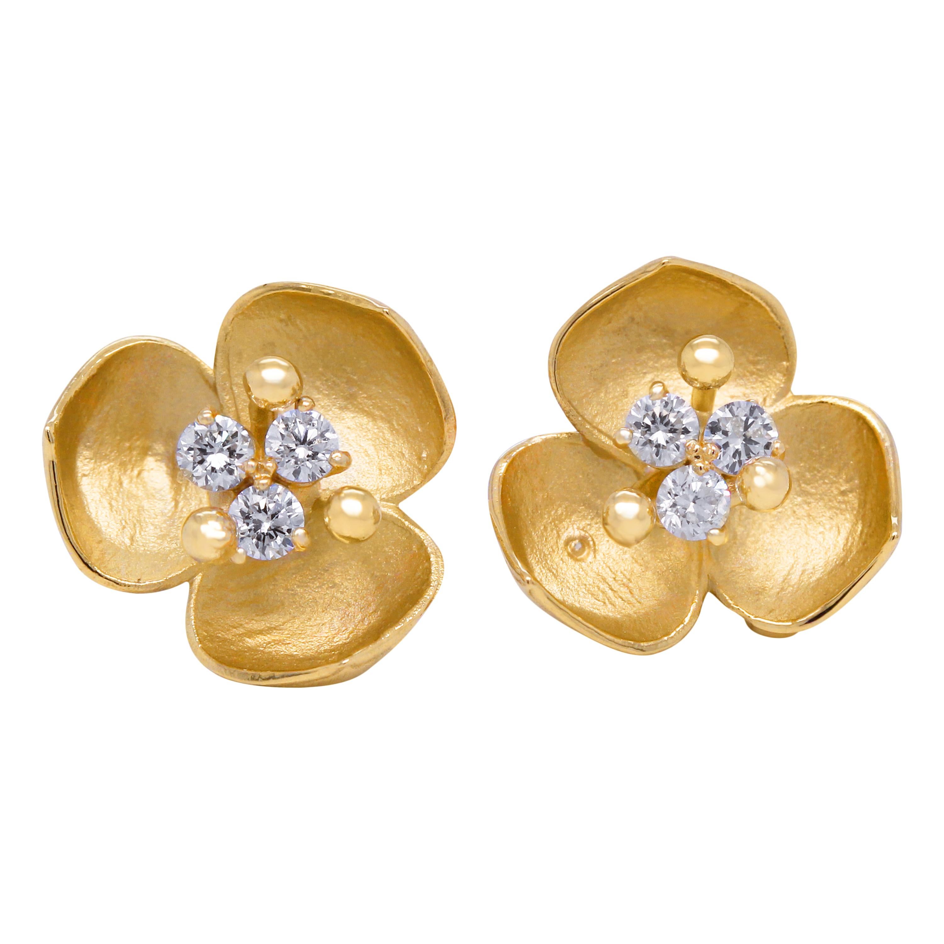 earrings with three diamonds