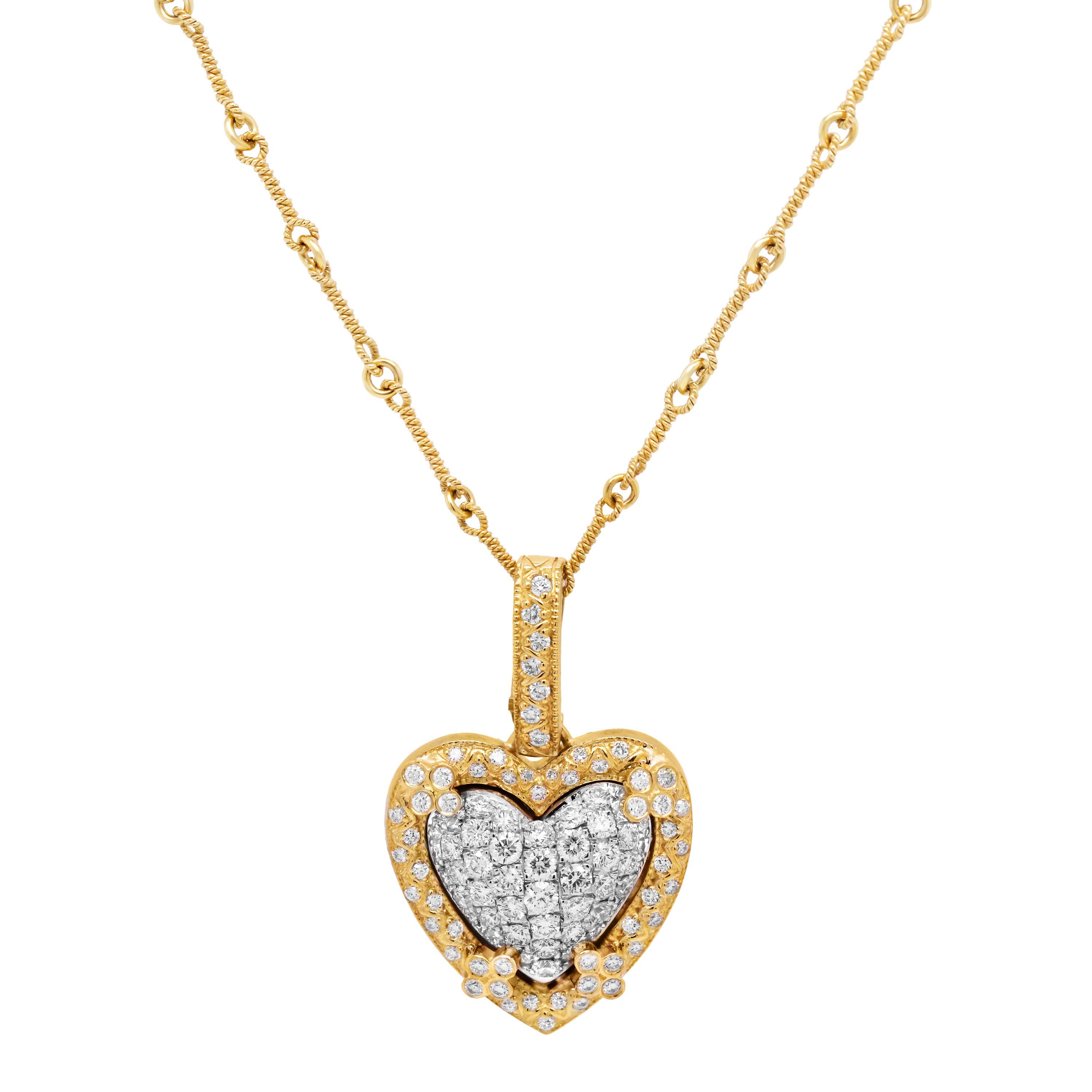 Stambolian 18 Karat Yellow White Gold Diamond Heart Enhancer Pendant Necklace

This beautiful heart pendant features diamonds pavé set in the center with diamonds also all throughout the pendant.

A handmade bone chain is used that is also solid 18k