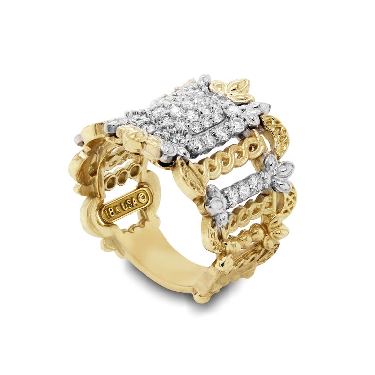 Stambolian 18K Yellow White Gold Pavé Set Diamond Wide Band Ring

This one-of-a-kind masterpiece features one of the most beautiful and unique ring designs with incredible attention to detail

0.90 carat G color, VS clarity white diamonds

Ring is a