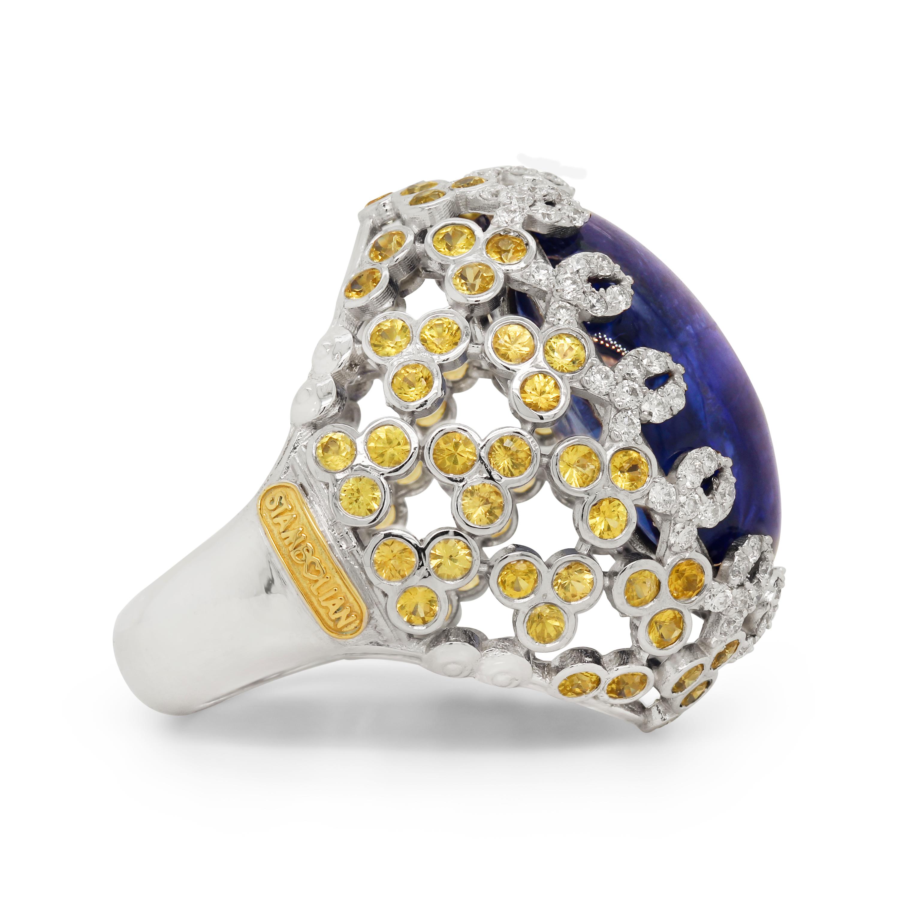 Stambolian 18K Gold AAA Quality Cabochon Tanzanite Yellow Sapphire Diamonds Ring

This is a one-of-a-kind dome ring that features a perfect cabochon-cut Tanzanite in a basket style setting with yellow sapphires and diamonds set all throughout the