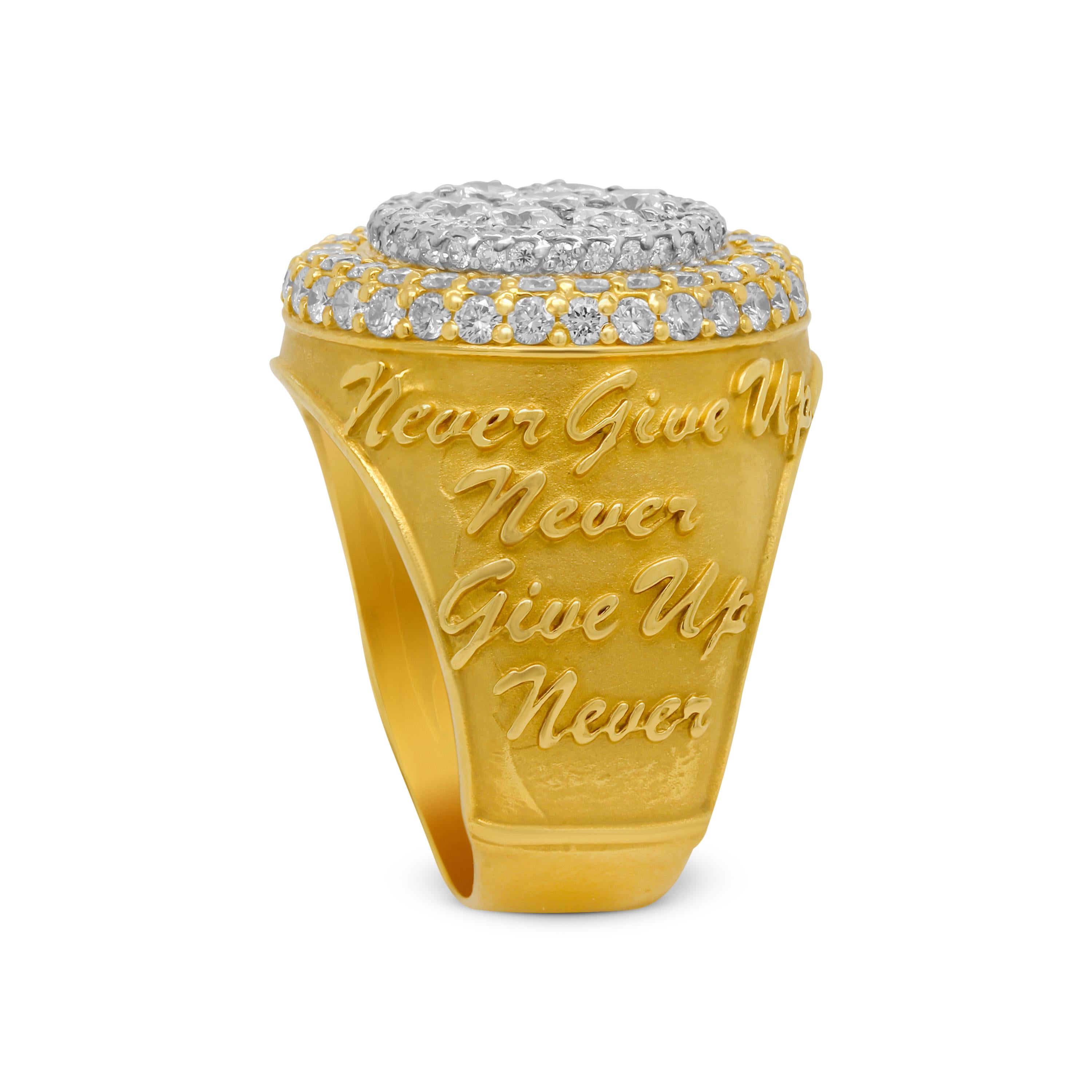 Stambolian 18K Gold Diamond Phoenix Bird Never Give Up Mens Ring

This state-of-the-art mens ring by Stambolian is a signature of their 2019 mens collection featuring diamonds in the center and a message on both sides.

One side of the ring reads