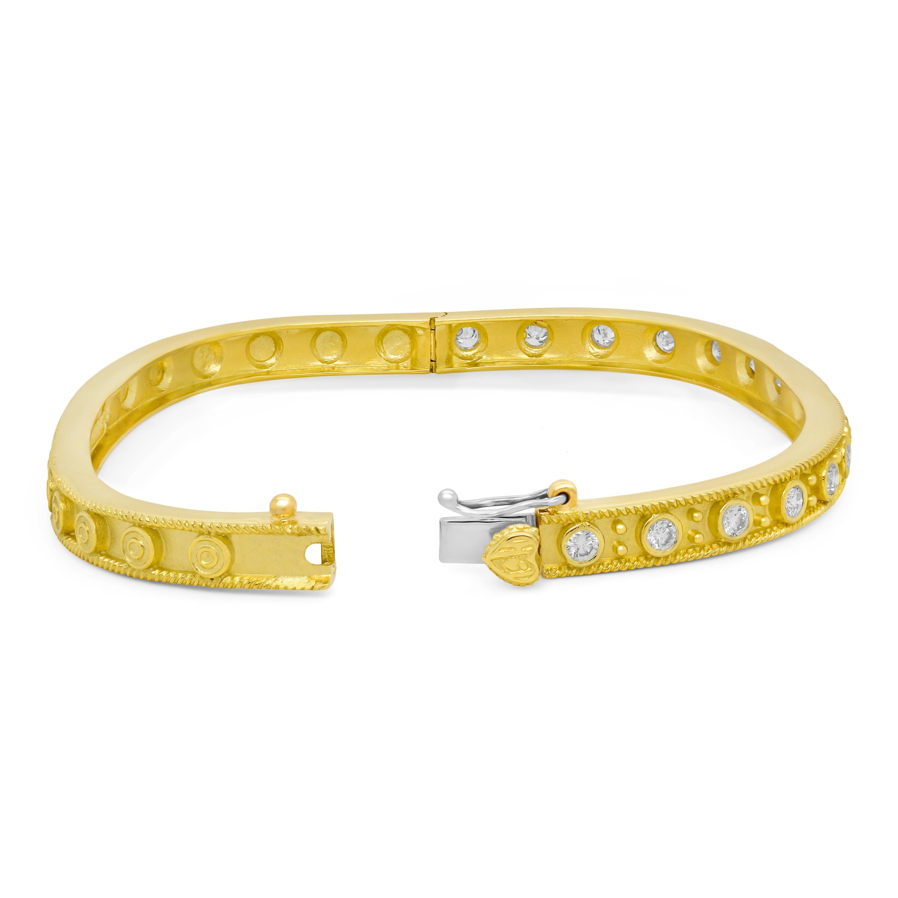 Stambolian 18K Gold Diamonds Square Bangle Bracelet

This stunning bangle is perfect for a stackable and features sixteen diamonds, bezel set all across one side of the piece

0.82 carat apprx. G color, VS clarity diamonds

Bangle comes standard in