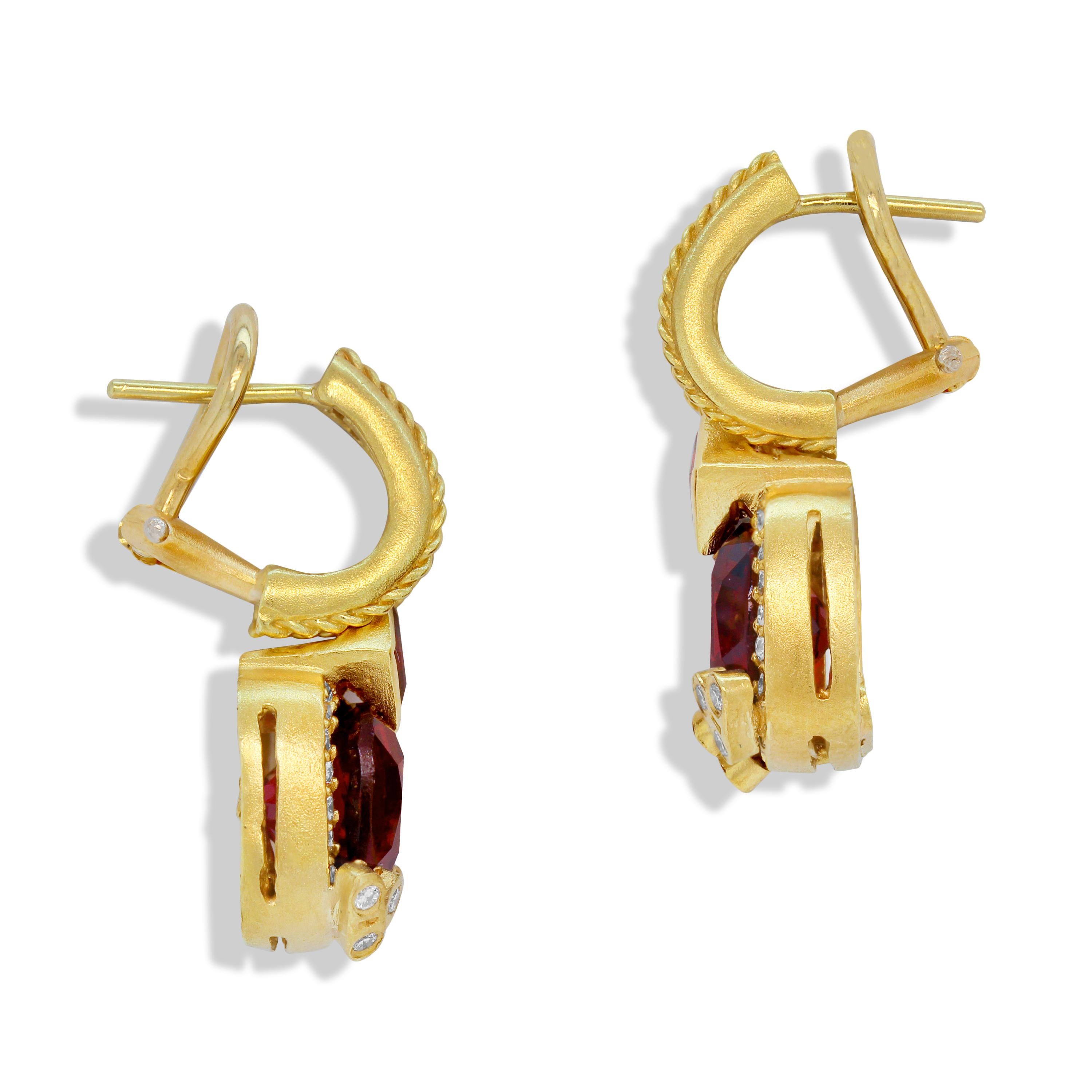Stambolian 18K Gold Diamonds Red Garnet and Ruby Drop Dangle Earrings

Two exceptional Garnets are paired with gorgeous rubies and surrounded with diamonds.

6.08 carat apprx. Garnet total weight.
0.56 carat Ruby total weight.
0.58 carat G color, VS