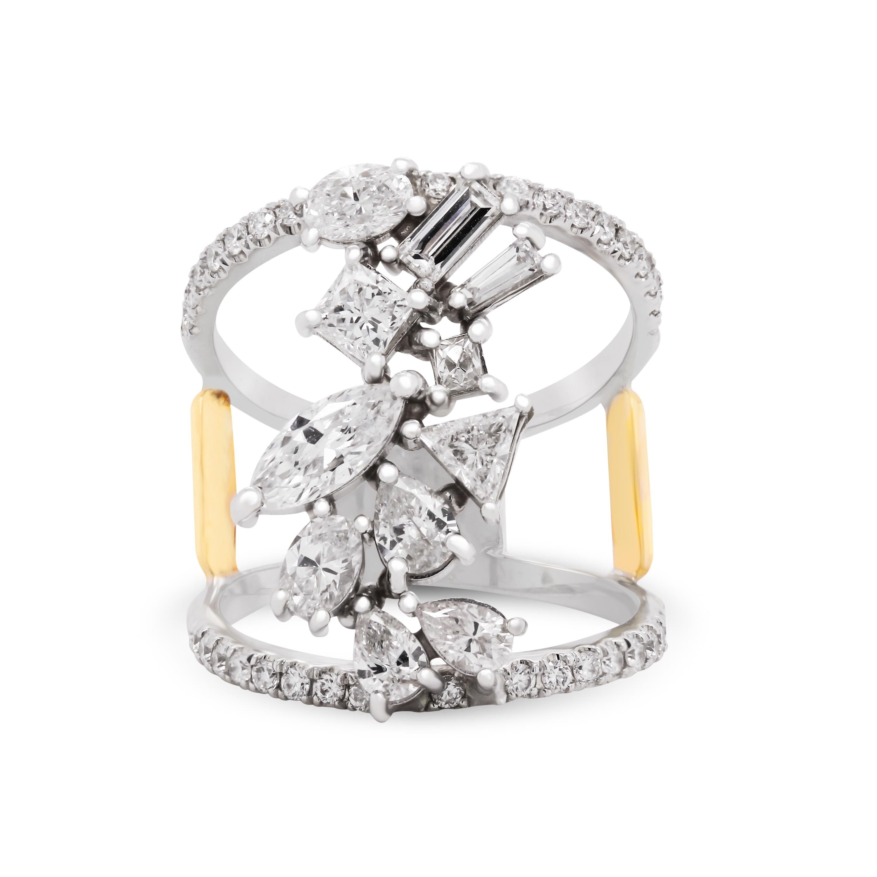 Stambolian 18K Gold Fancy Form Birne Marquise Trillion Baguette Diamanten Ring

Dieser einzigartige Ring von Stambolian besteht aus einem doppelten Band, das mit Diamanten besetzt ist, sowie aus geraden und spitz zulaufenden Baguette-, Marquise-,