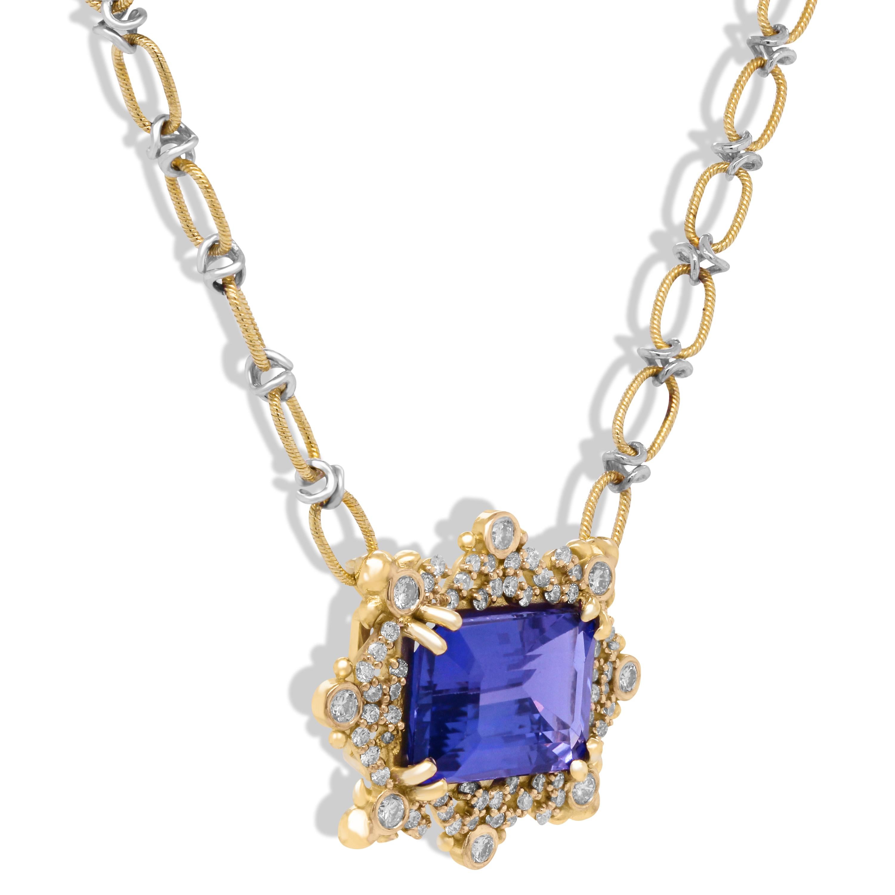 Stambolian 18K Two Tone Gold Diamond Emerald Cut Tanzanite Pendant Necklace

This one-of-a-kind pendant is attached to a two-tone, handmade chain and is made in entirely solid 18k gold.

Emerald-cut Tanzanite center is AAA quality and is 9.78