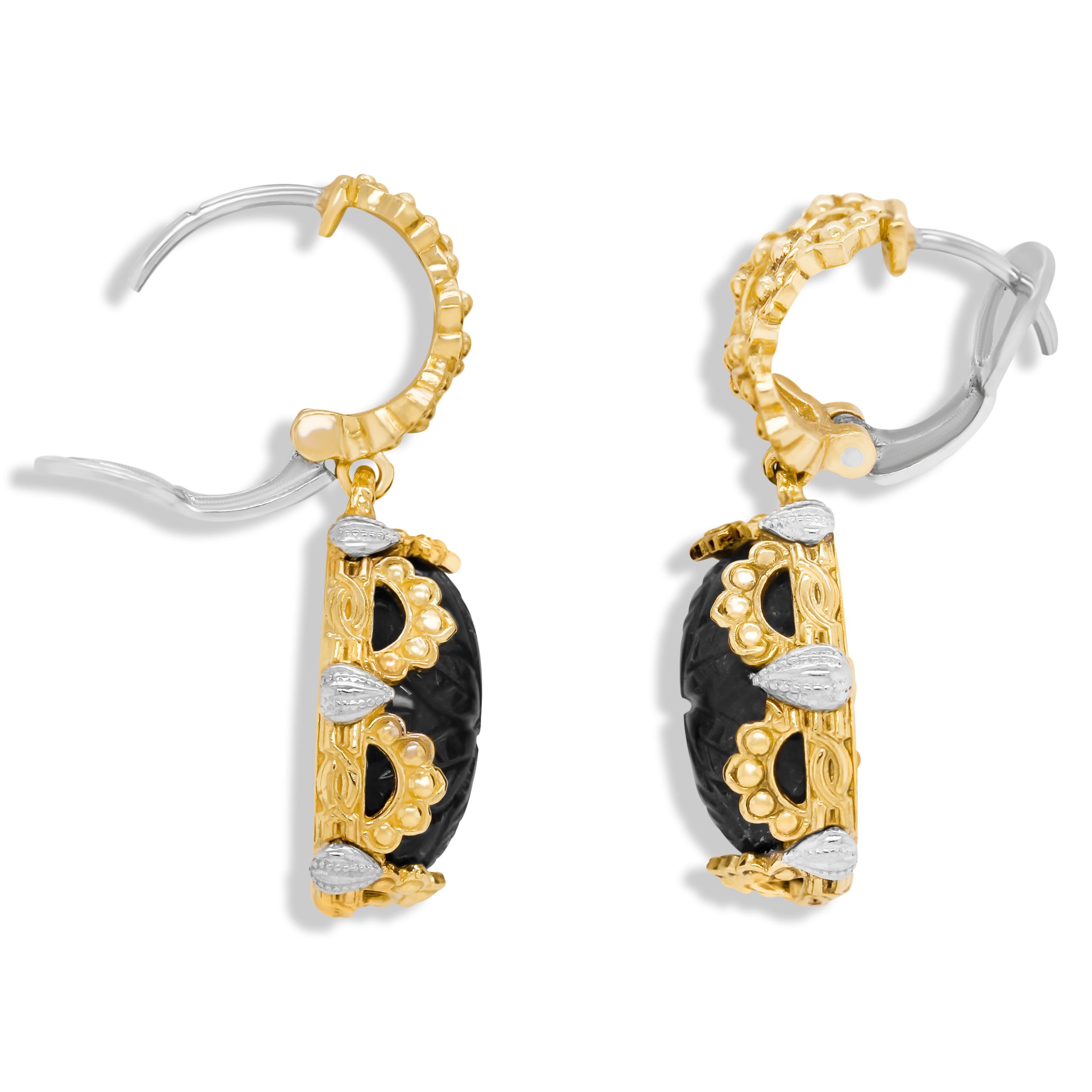 Stambolian 18K Two Tone Gold Floral Carved Labradorite Drop Earrings

This special pair of earrings feature two oval, floral-carved Labradorite centers

Earrings measure 1.20 inch in length by 0.53 inch width

French backs used and allow the