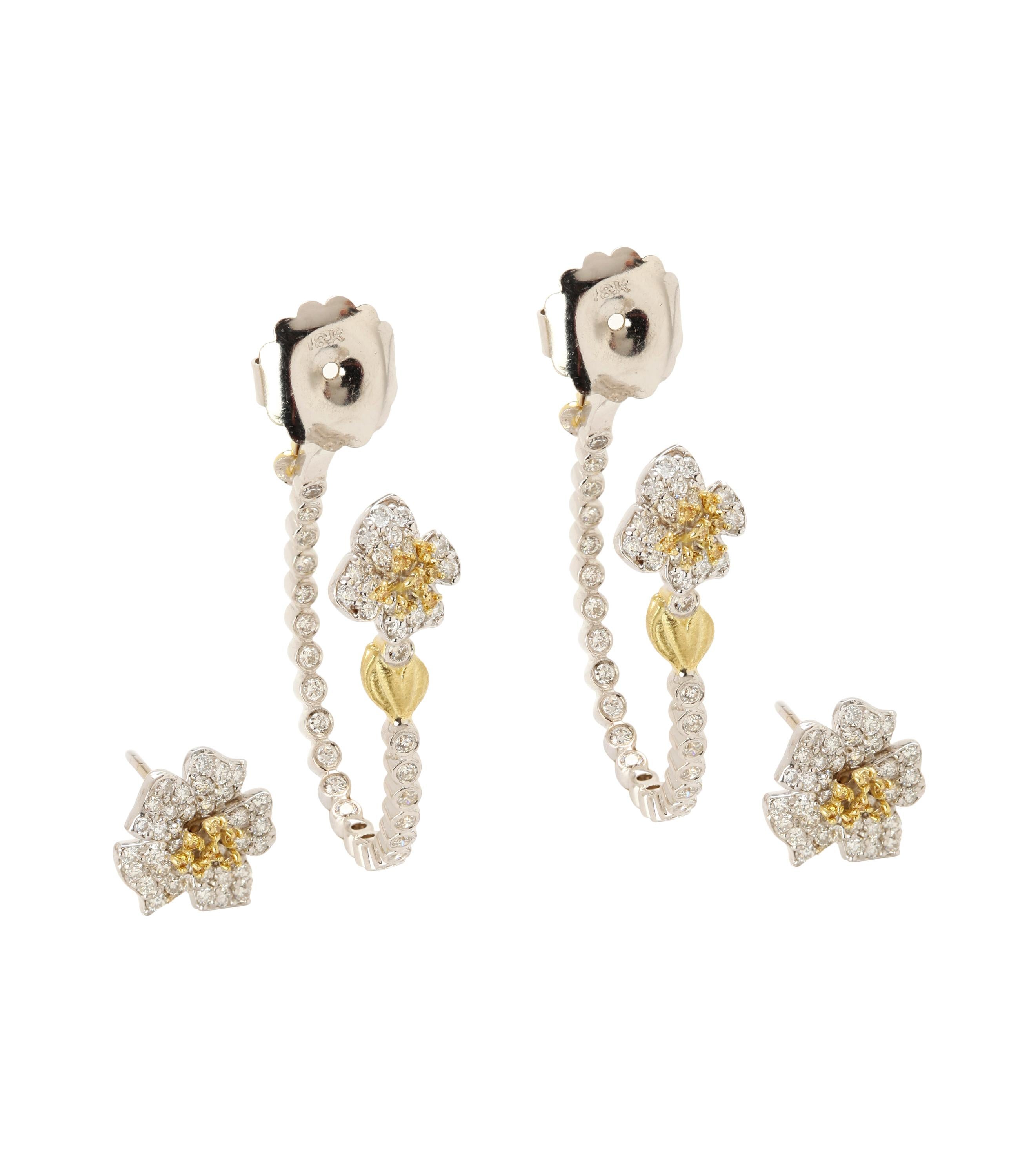 Zweiteilige florale Stambolian-Ohrringe aus 18 Karat weißen und gelben Diamanten mit Blumenmuster

Die Ohrringe sind zweiteilig, d.h. die Blume mit den gelben und weißen Diamanten wird von vorne getragen, während der Rest der Ohrringe von hinten