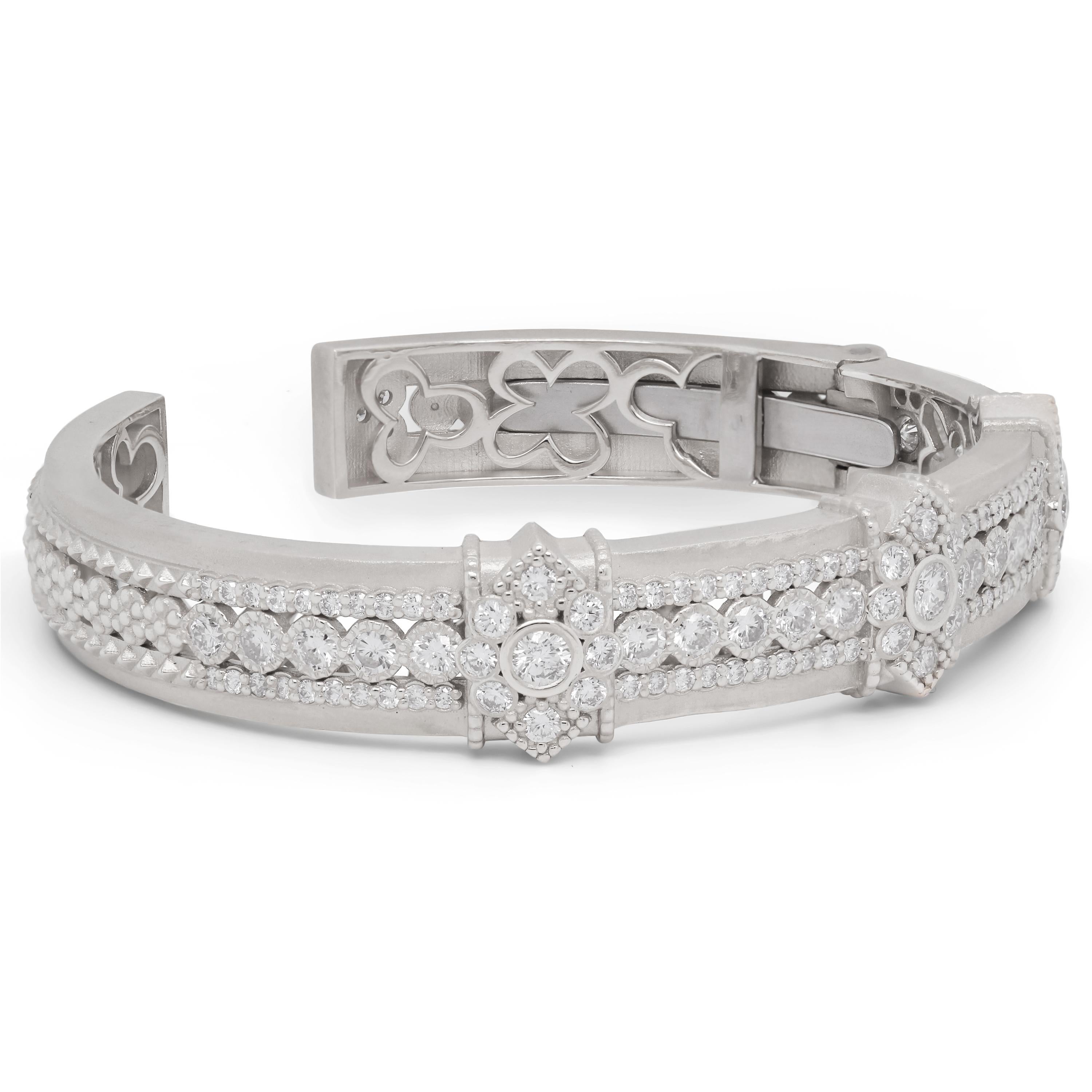 Stambolian 18K White Gold and Diamond Bangle Bracelet

This state-of-the-art, handmade bracelet showcases the craftsmanship and design all throughout the piece. Diamonds are set on just about every aspect of his bangle. 

Apprx. 3.46 carat G color,
