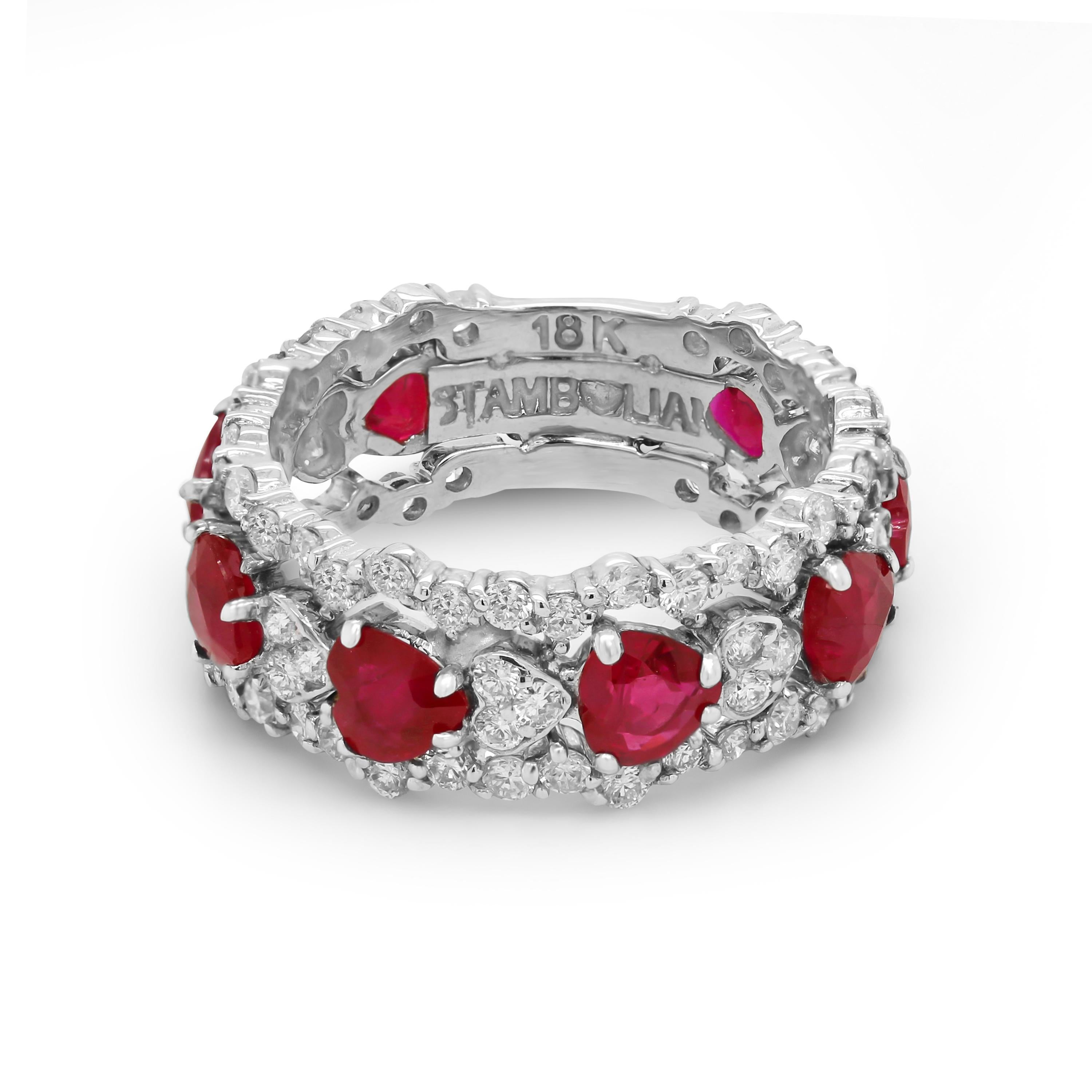 Stambolian 18K White Gold and Diamond Heart Shape Ruby Band Ring

This gorgeous band is set 3/4 of the way with diamonds and ruby all throughout.

2.50 carat Heart Shape Ruby total weight

1.15 carat G color, VS clarity diamonds total weight

7.4mm