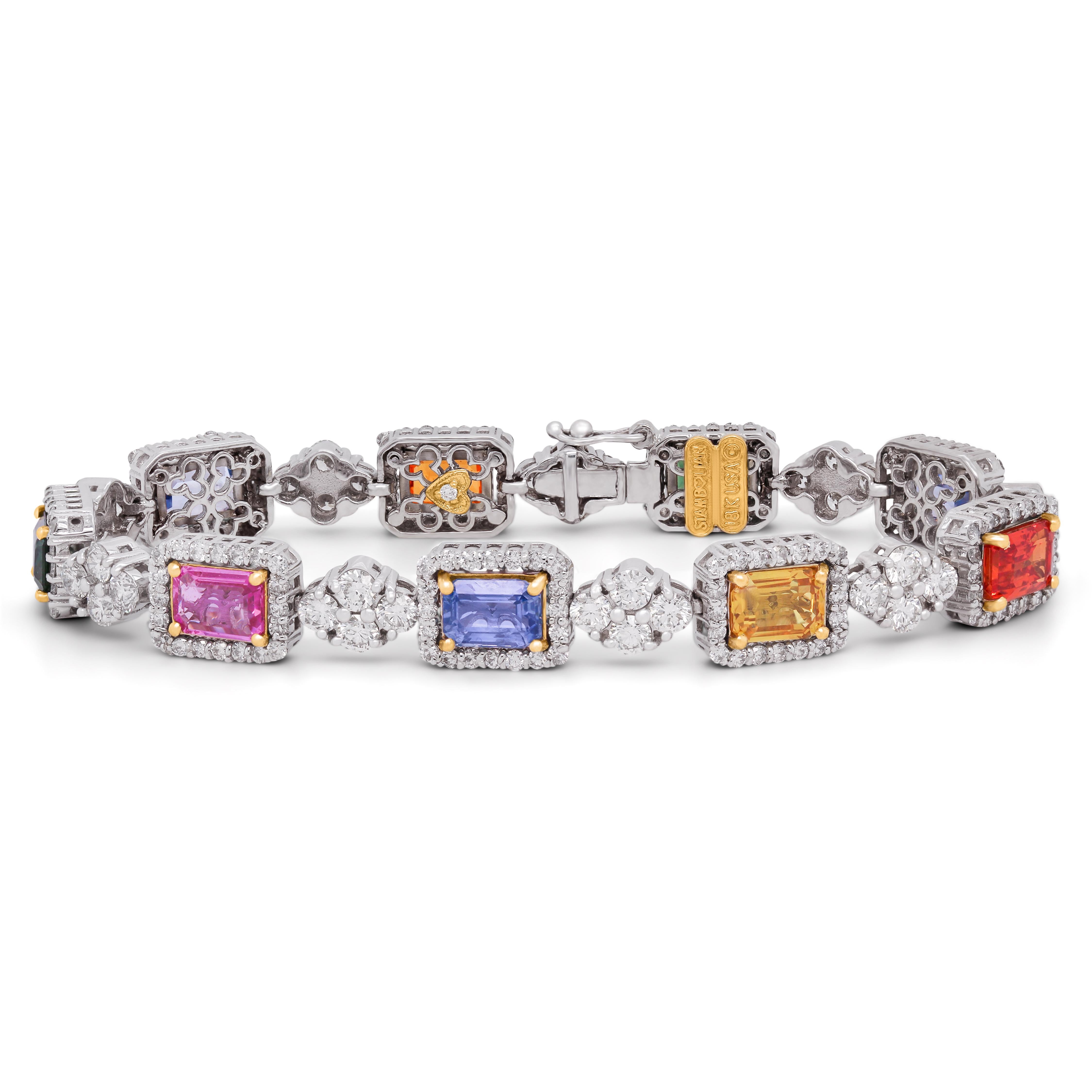 Stambolian 18K White Gold Diamond Multi Color Sapphire Bracelet

Bracelet features nine, Emerald-Cut, Multi-Color Sapphires. Colors included are yellow, orange, blue, pink, green. No two of these bracelets have the same color-combinations, making
