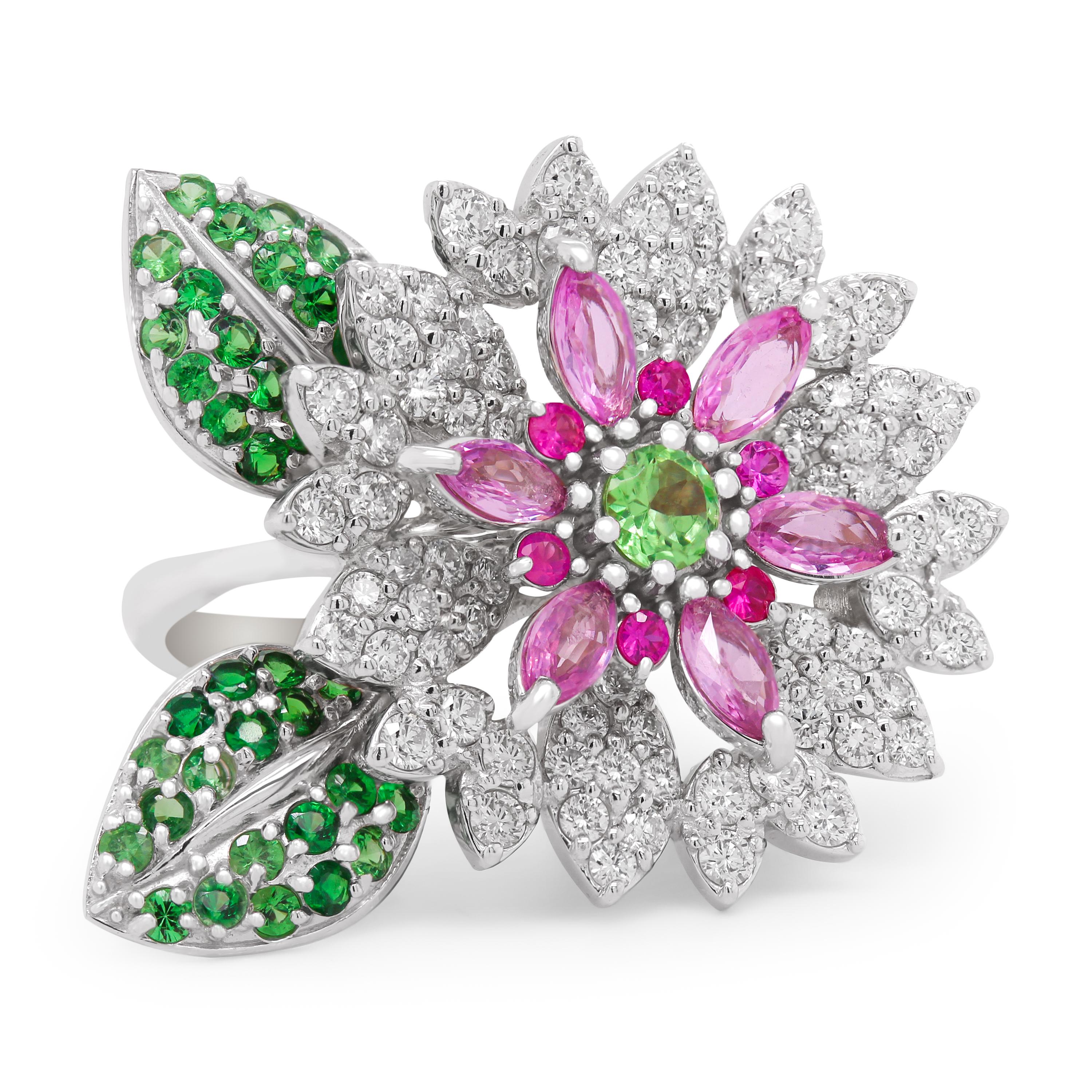 Stambolian 18k White Gold Marquise Pink Sapphires Diamonds Tsavorite Floral Ring

This stunning ring features a row of marquise-cut pink sapphires and a tsavorite center along with damond set petals and two leaves set with Tsavorites, shaded dark to