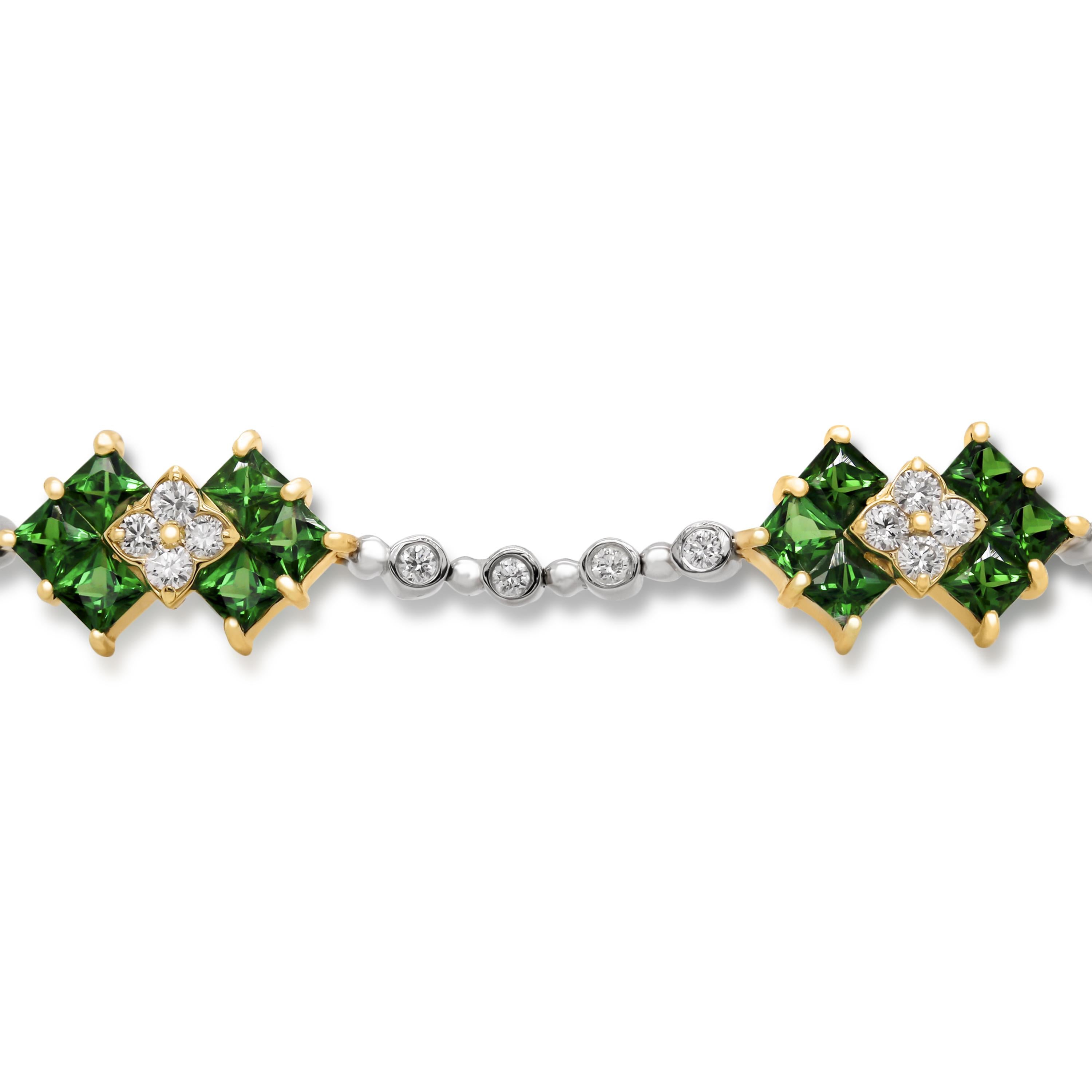 Stambolian 18K White Yellow Gold Diamond Princess Cut Tsavorite Tennis Bracelet

This state of the art bracelet by Stambolian is created in solid 18k white gold with diamonds and tsavorites. The princess-cut tsavorites are set in solid 18k yellow