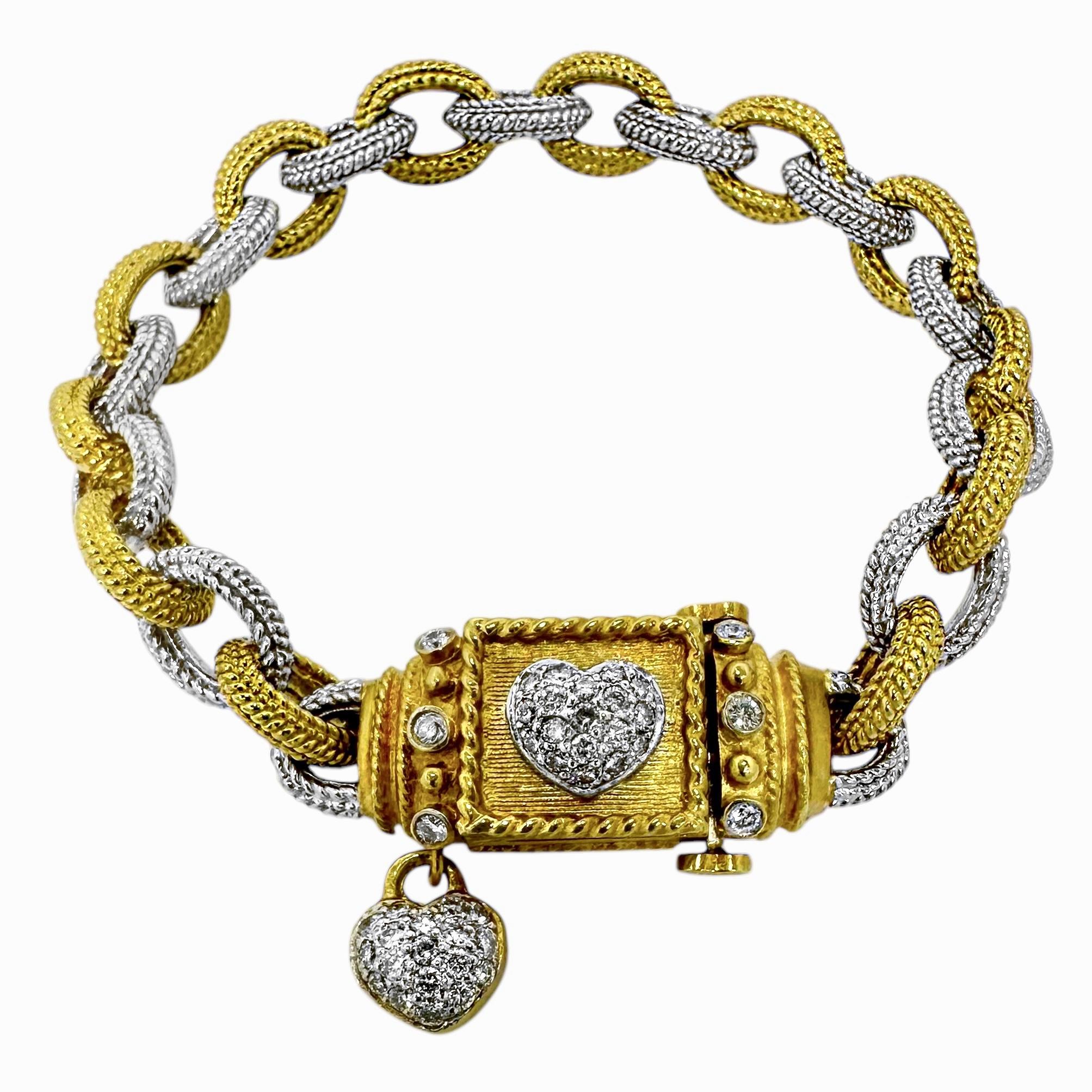 The American manufacturer, Stambolian,  consistently produces items that are creatively and beautifully designed. This 18K yellow and white gold bracelet is a fine example of their work. Each link measures 3/8 of an inch long by in excess of 1/4 of