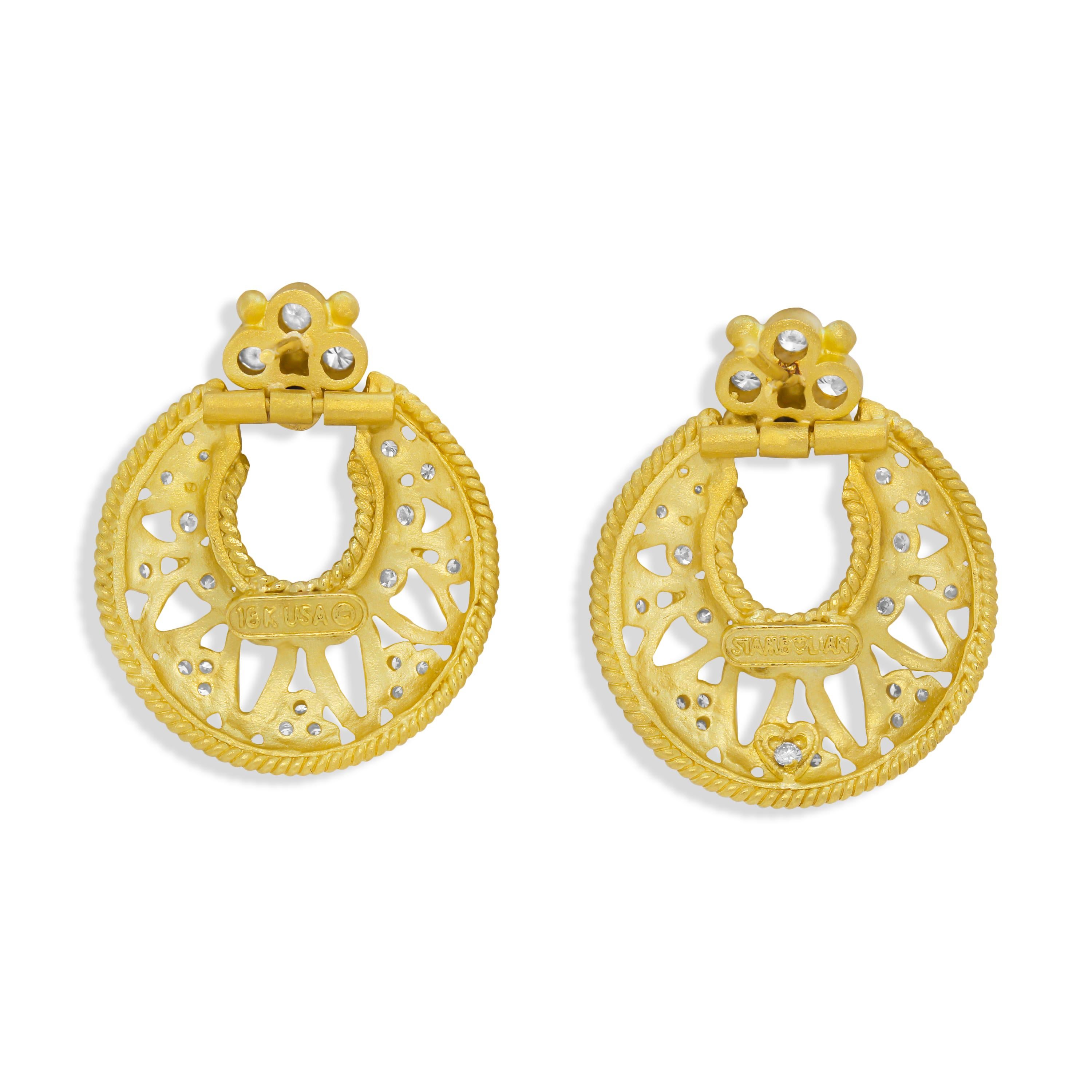 Stambolian 18K Yellow Gold and Bezel Set Diamonds Circle Doorknob Earrings

1 carat G color, VS clarity round cut diamonds

Earrings measure 1.1 inches in length x 0.9 inch width

Earrings use post-friction backs. 

Signed Stambolian and has the