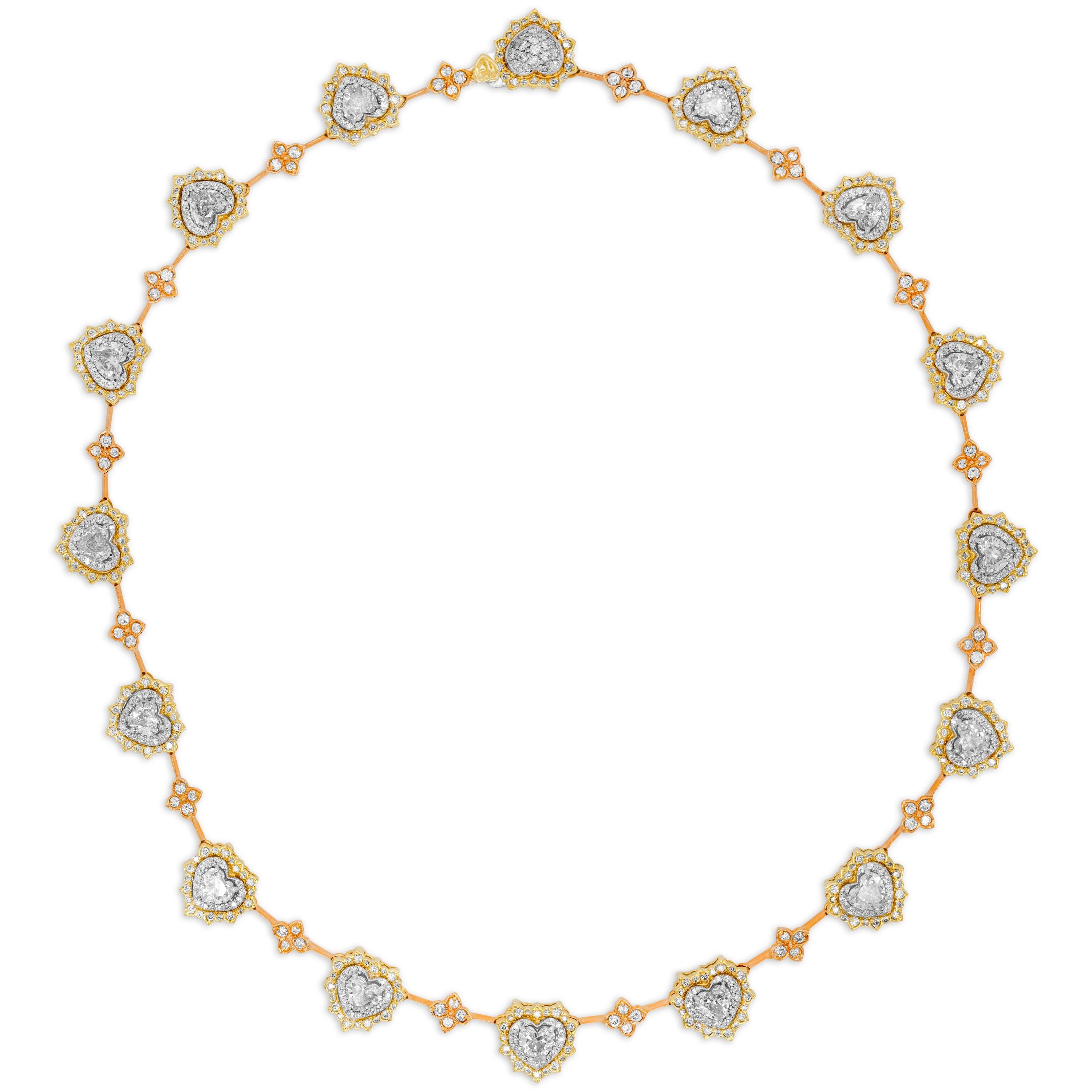Stambolian 18K Yellow Rose White Gold and Heart Shape Diamonds Choker Necklace

This one-of-a-kind necklace features 15 heart-shape diamonds with two rows of diamonds surrounding each diamond. The connections in between the hearts are done in rose